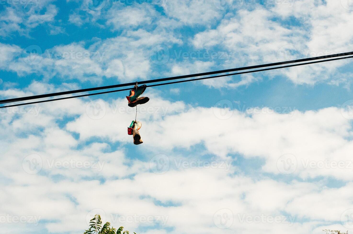 Sneakers Caught on a Telephone Wire photo