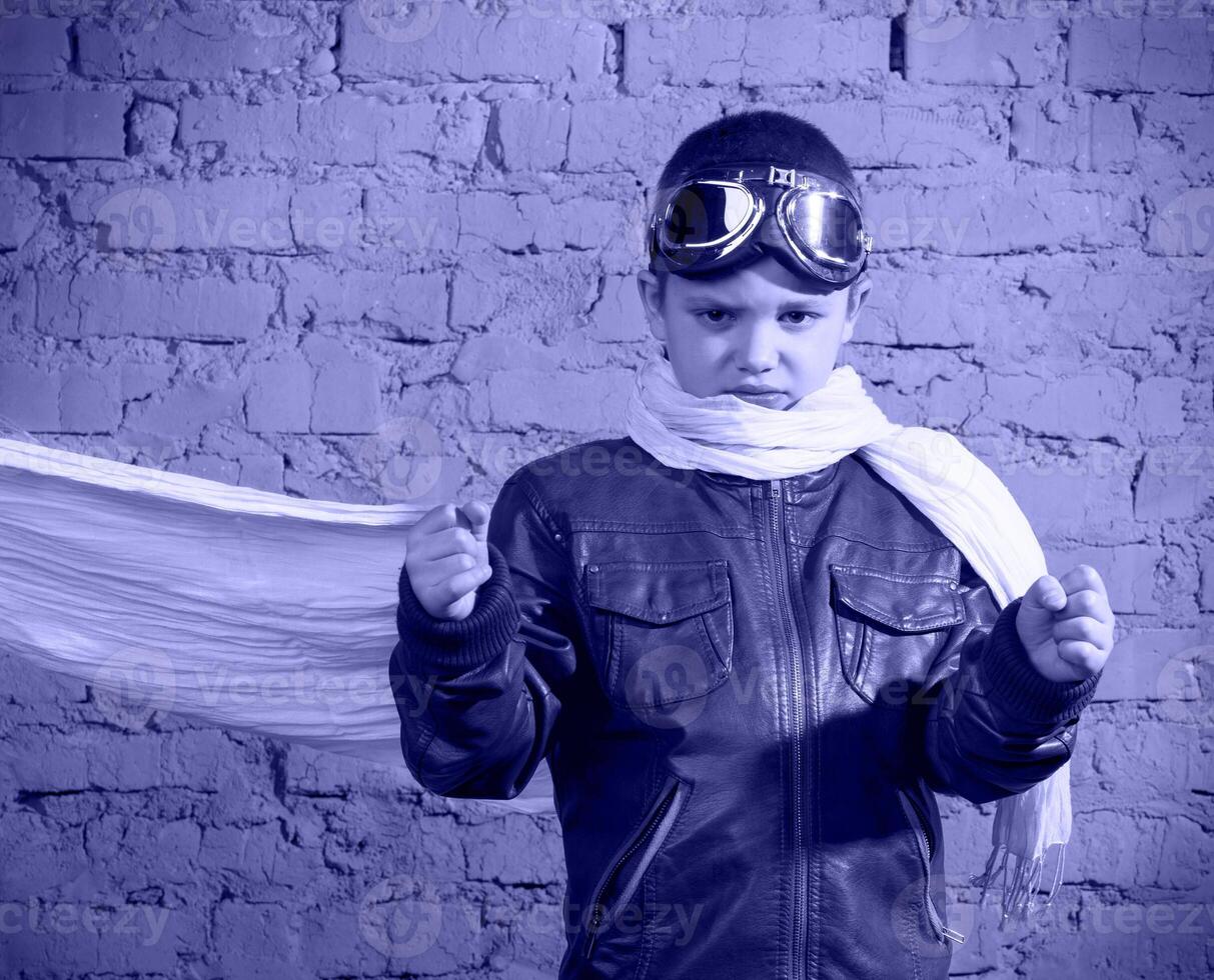 Little boy dreaming of becoming a pilot photo