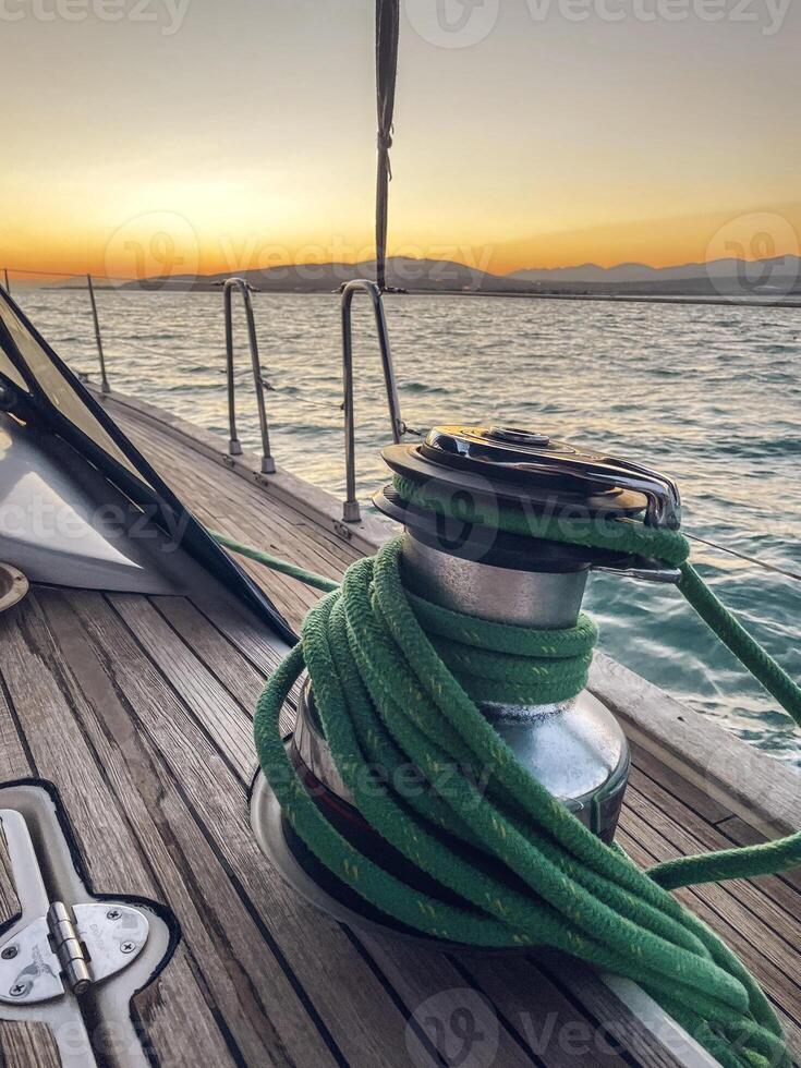 Sailboat winch and rope yacht detail. Yachting photo