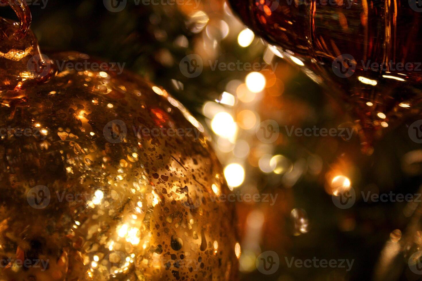 Close Up Detail of Gold Glass Christmas Ornament Bokeh Style photo
