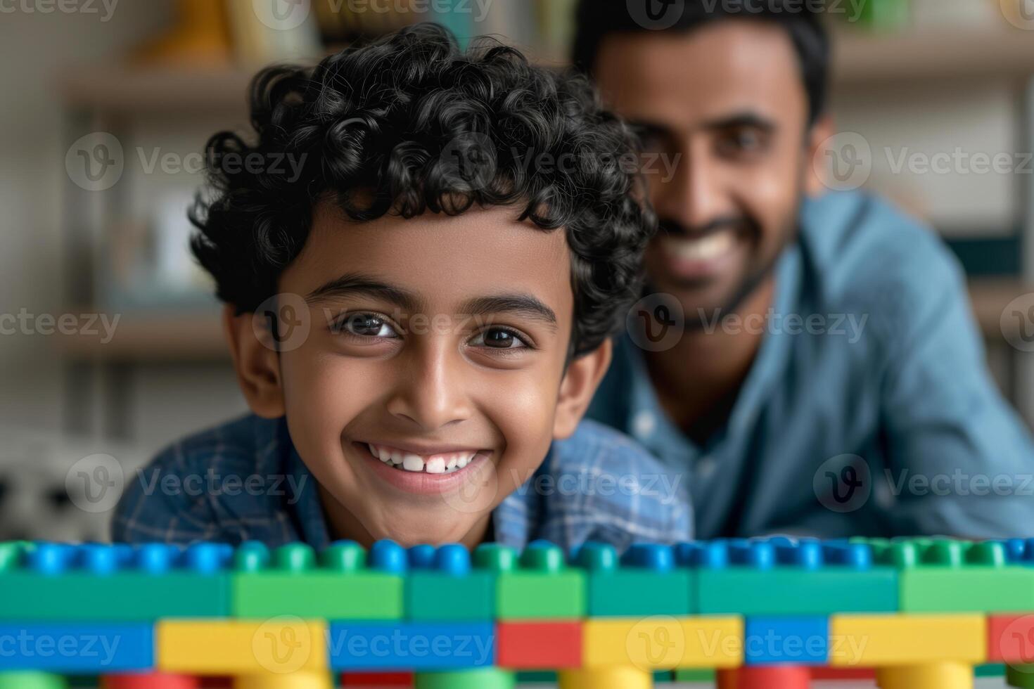 Father playing constructor with son child happy kid caring dad family boy playful toys build building together young creative happiness emotion creativity expression parent skill cute photo