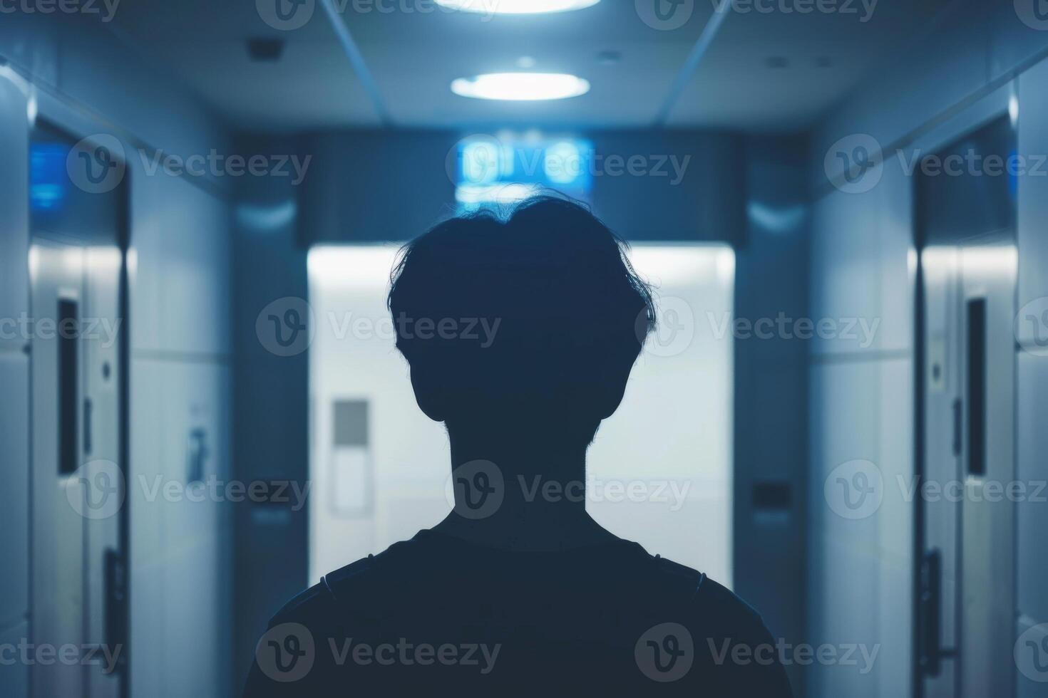 Young person standing in front of door decision making deciding entering light welcome guest concept real estate career path choosing study choice possibility opportunities mortgage photo