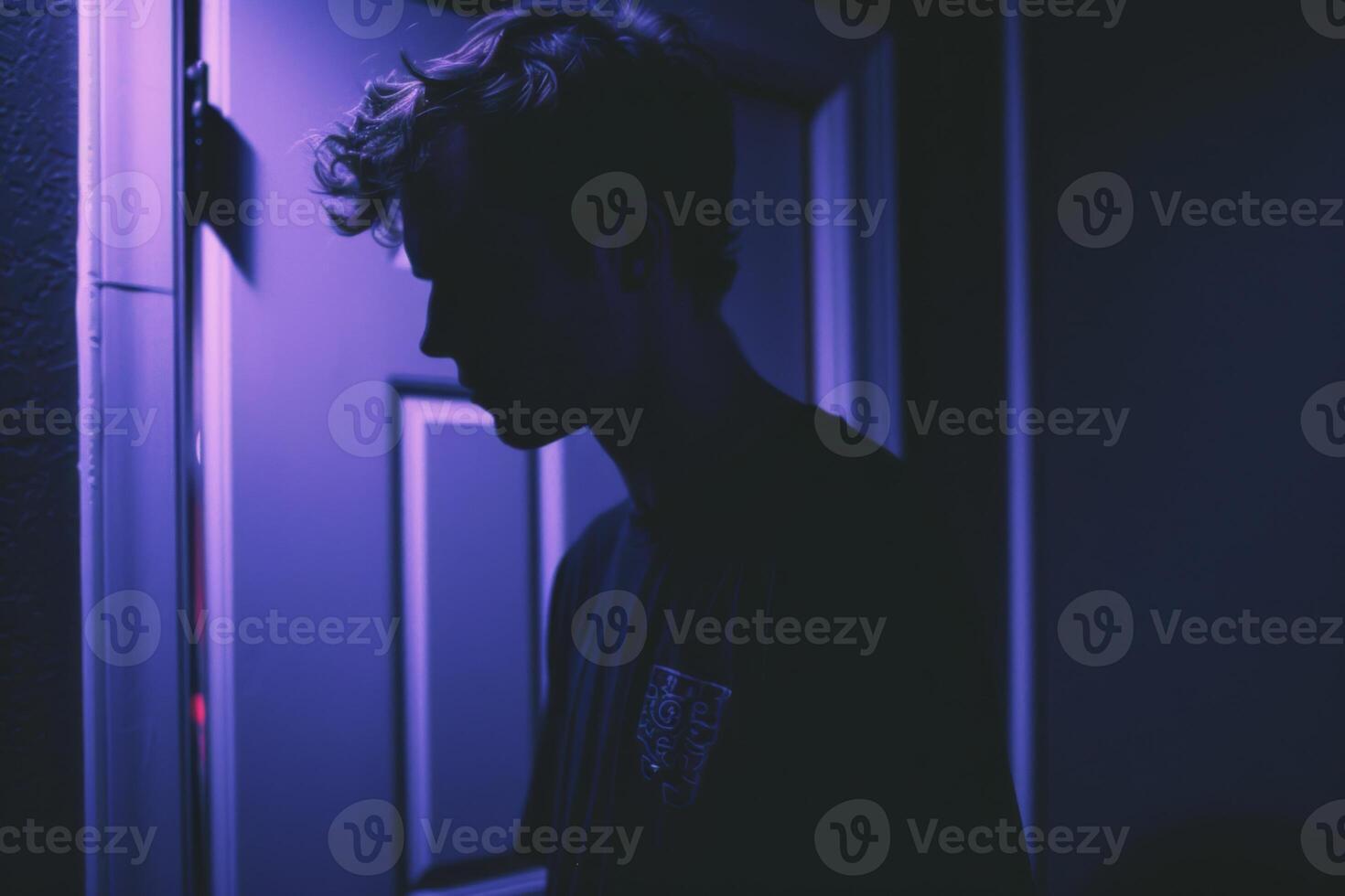 Young person standing in front of door decision making deciding entering light welcome guest concept real estate career path choosing study choice possibility opportunities mortgage photo