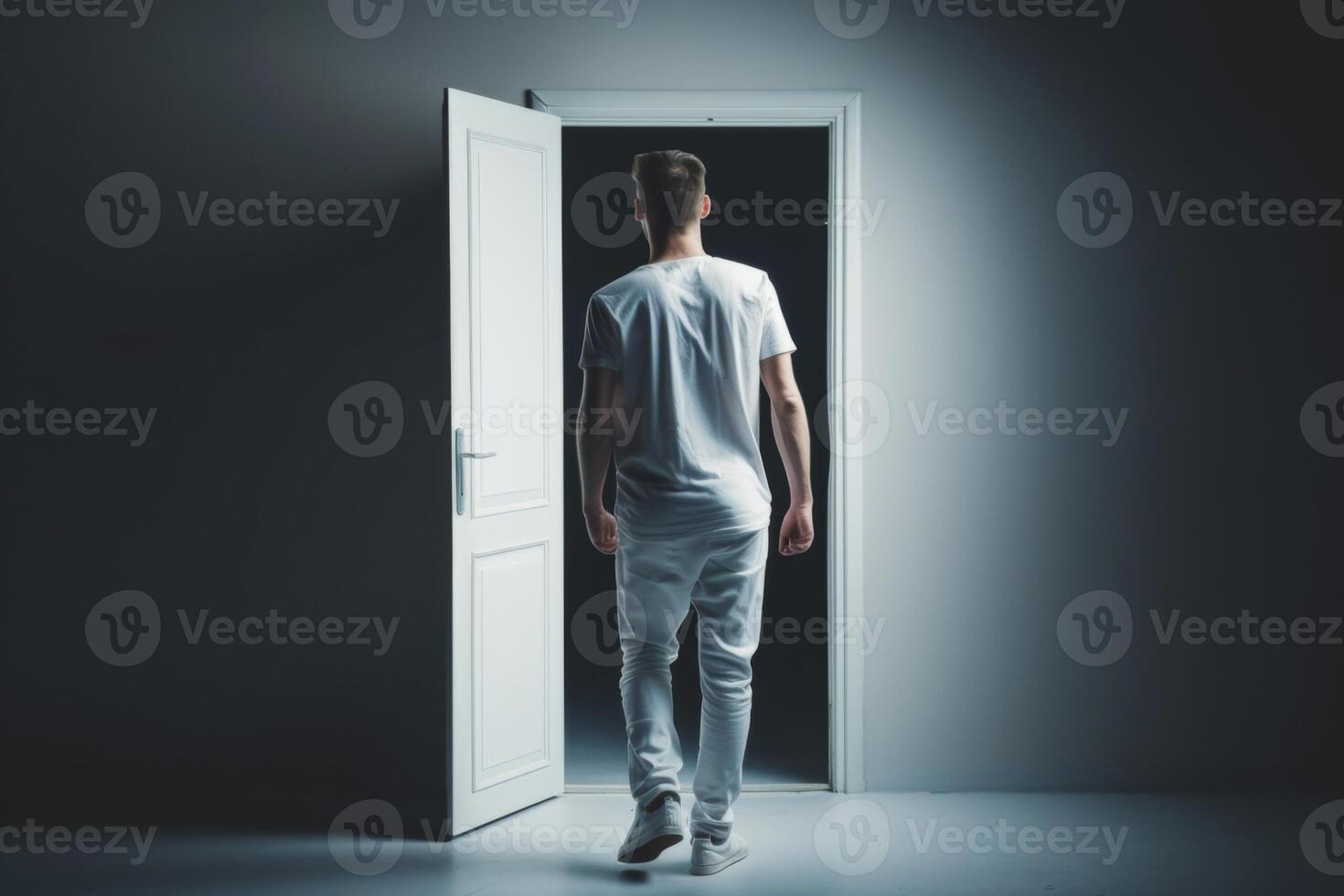 Young person standing in front of door decision making deciding entering light welcome guest concept real estate career path choosing study choice possibility opportunities mortgage photo