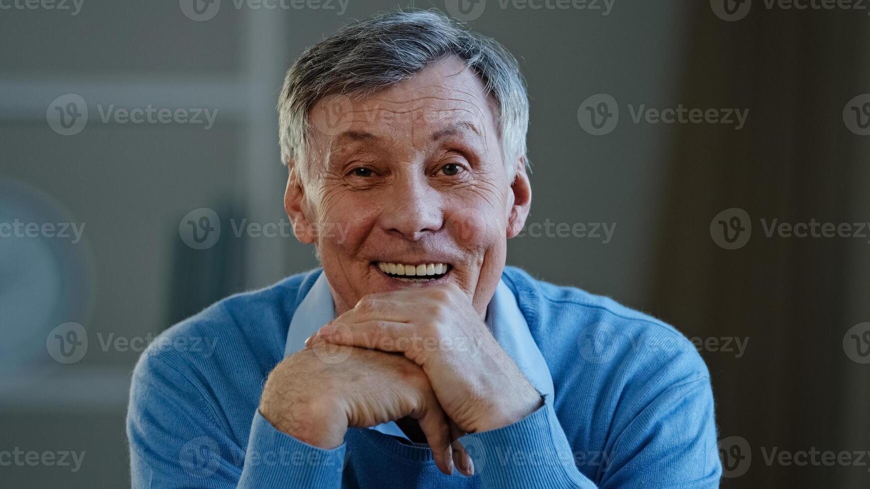 Caucasian successful shocked surprised 60s man old pensioner senior male businessman grandfather looking at camera feeling shock delight joy smiling laughing with happiness winning victory good news photo