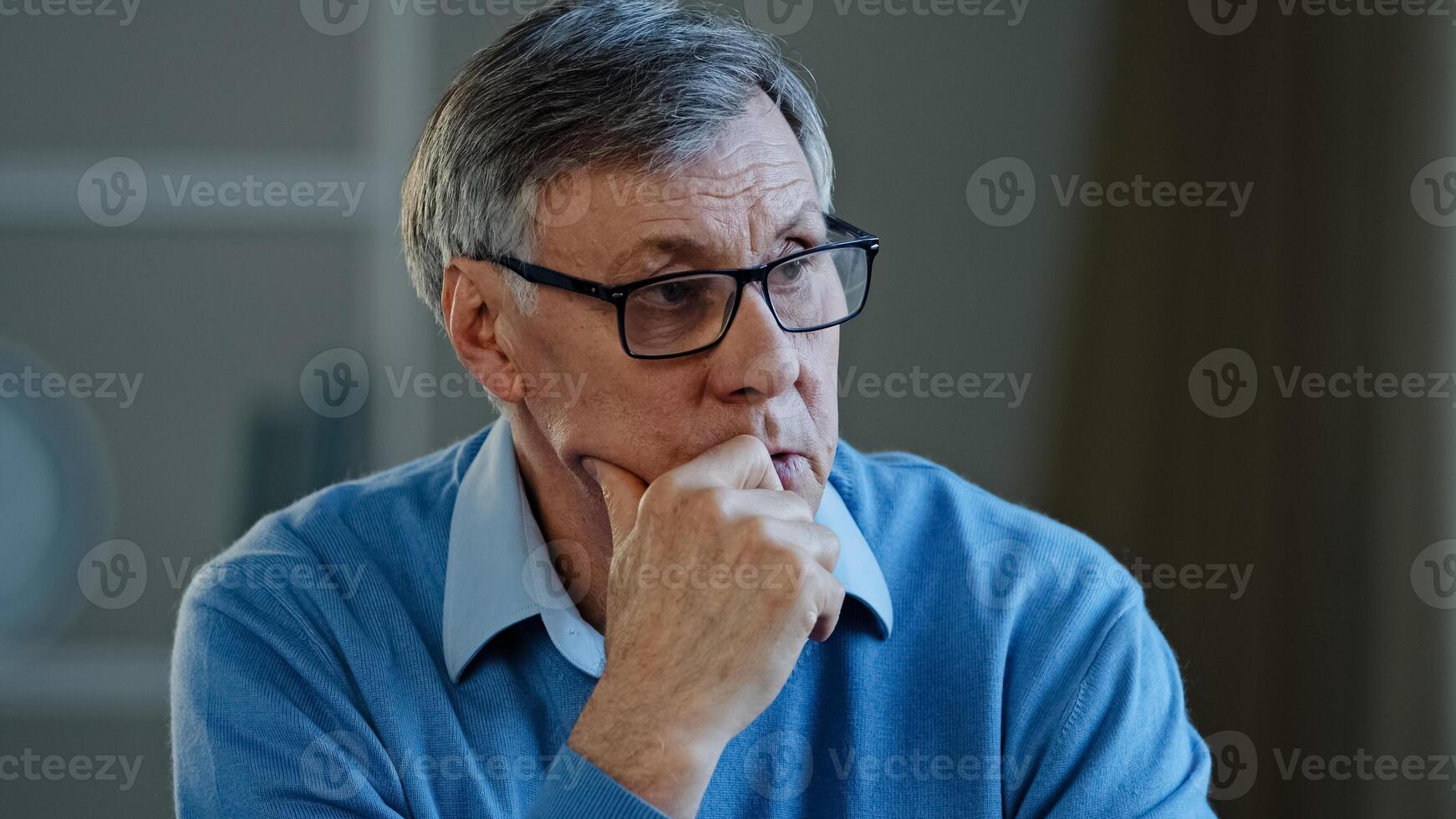 Portrait indoor in office home old thoughtful pensive confused senior man feel worried think memory problem take off glasses forgotten information, elderly old teacher look away anxious about trouble photo