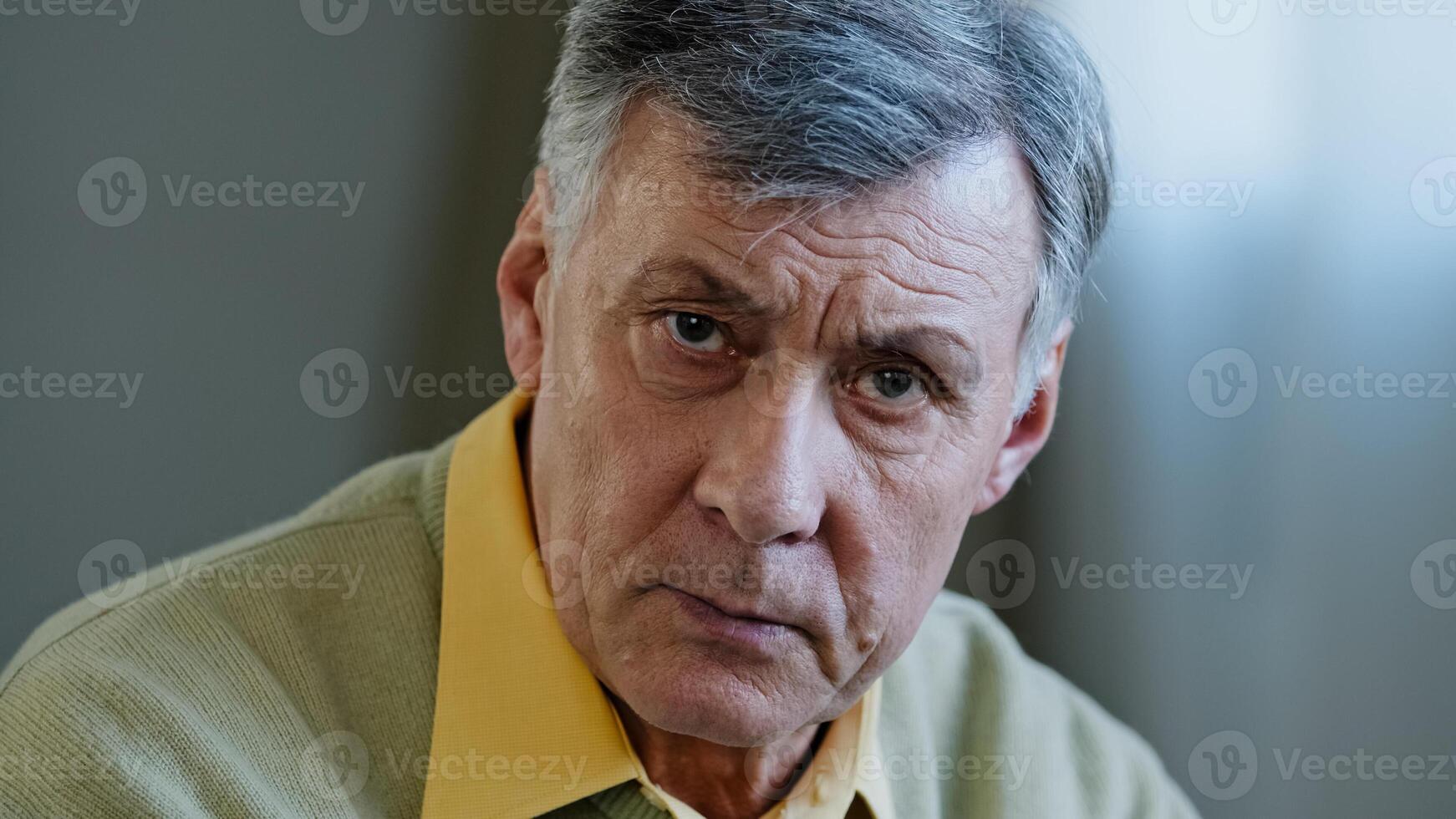 Close-up male portrait webcam view at home Caucasian angry mad face elderly serious old man looking at camera, shaking finger scolding upset talking explain irritation online conversation problem photo