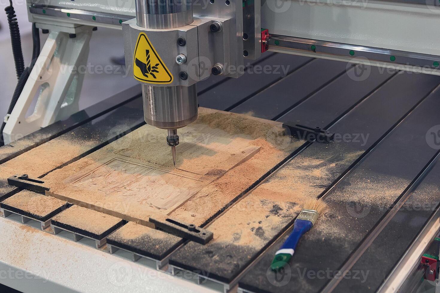 Cnc milling machine in work wood at the factory photo