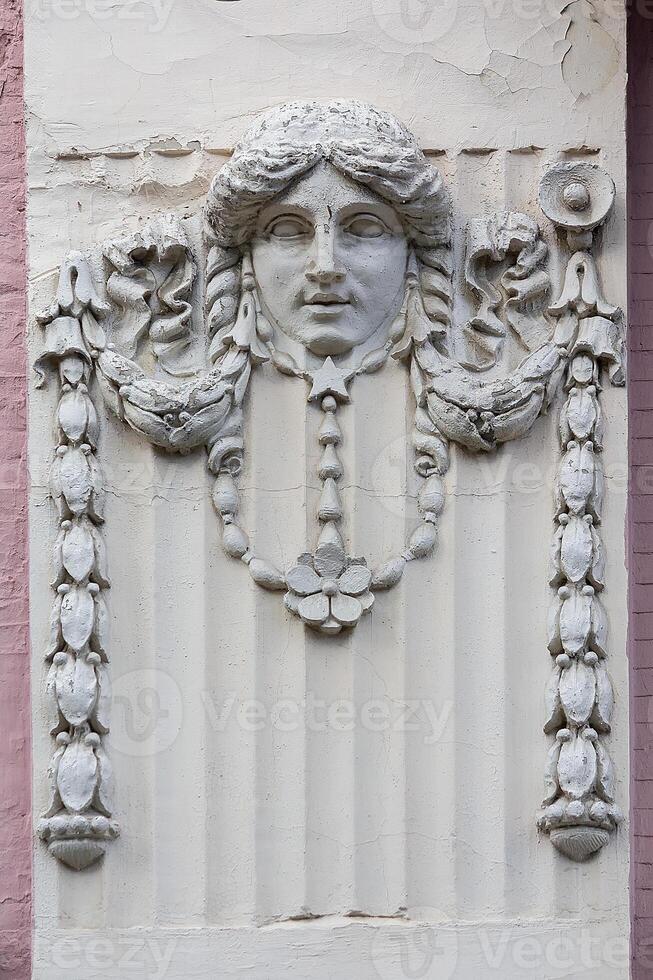 Soviet-era bas-relief on the facade of the building. Kyiv Ukraine photo