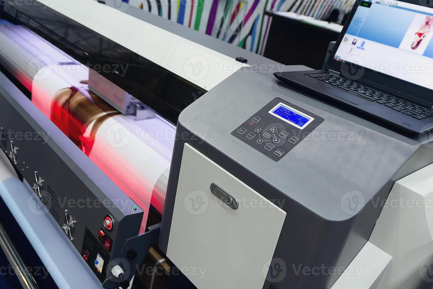 Large format printing machine in operation photo