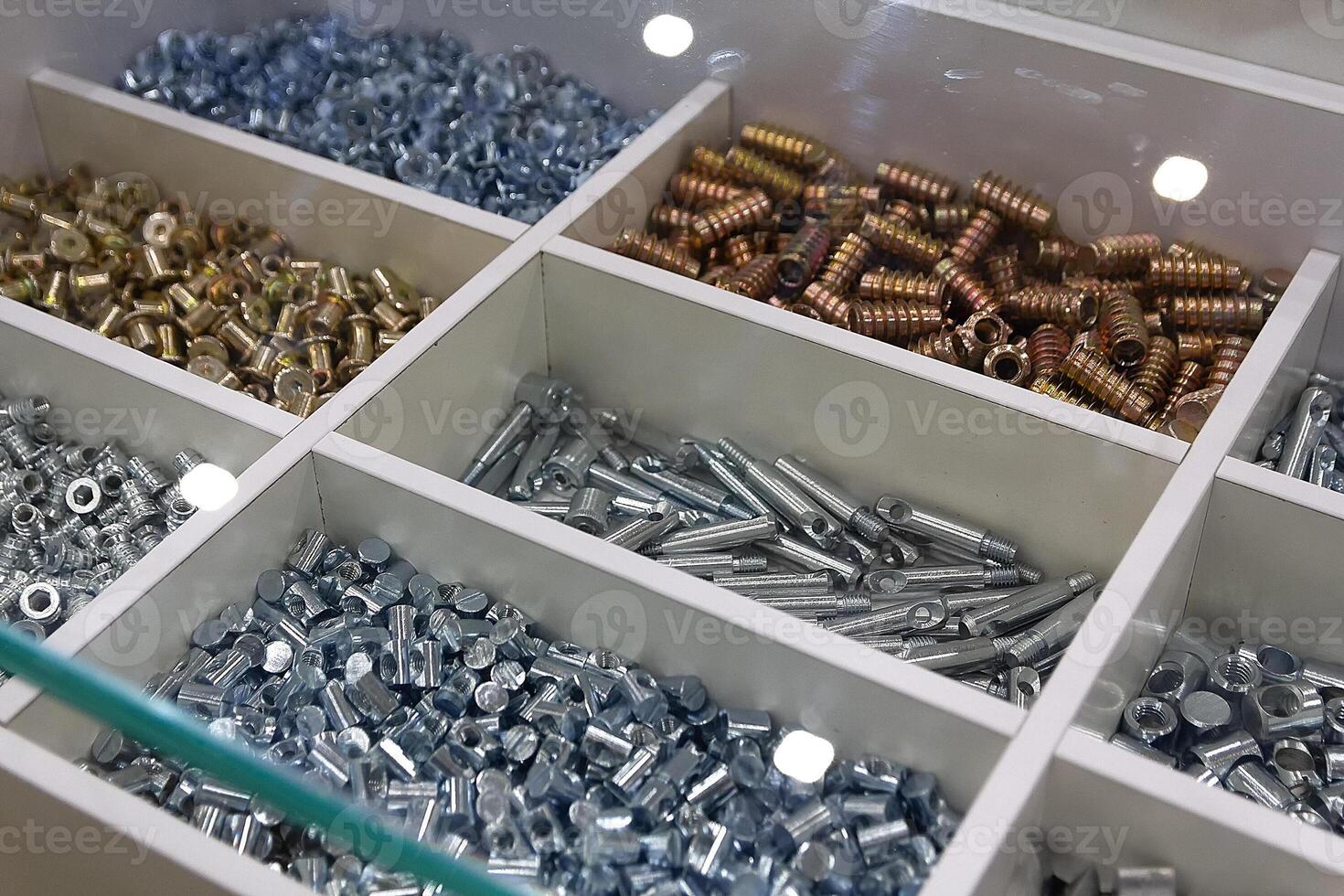 Furniture fasteners on the store counter photo