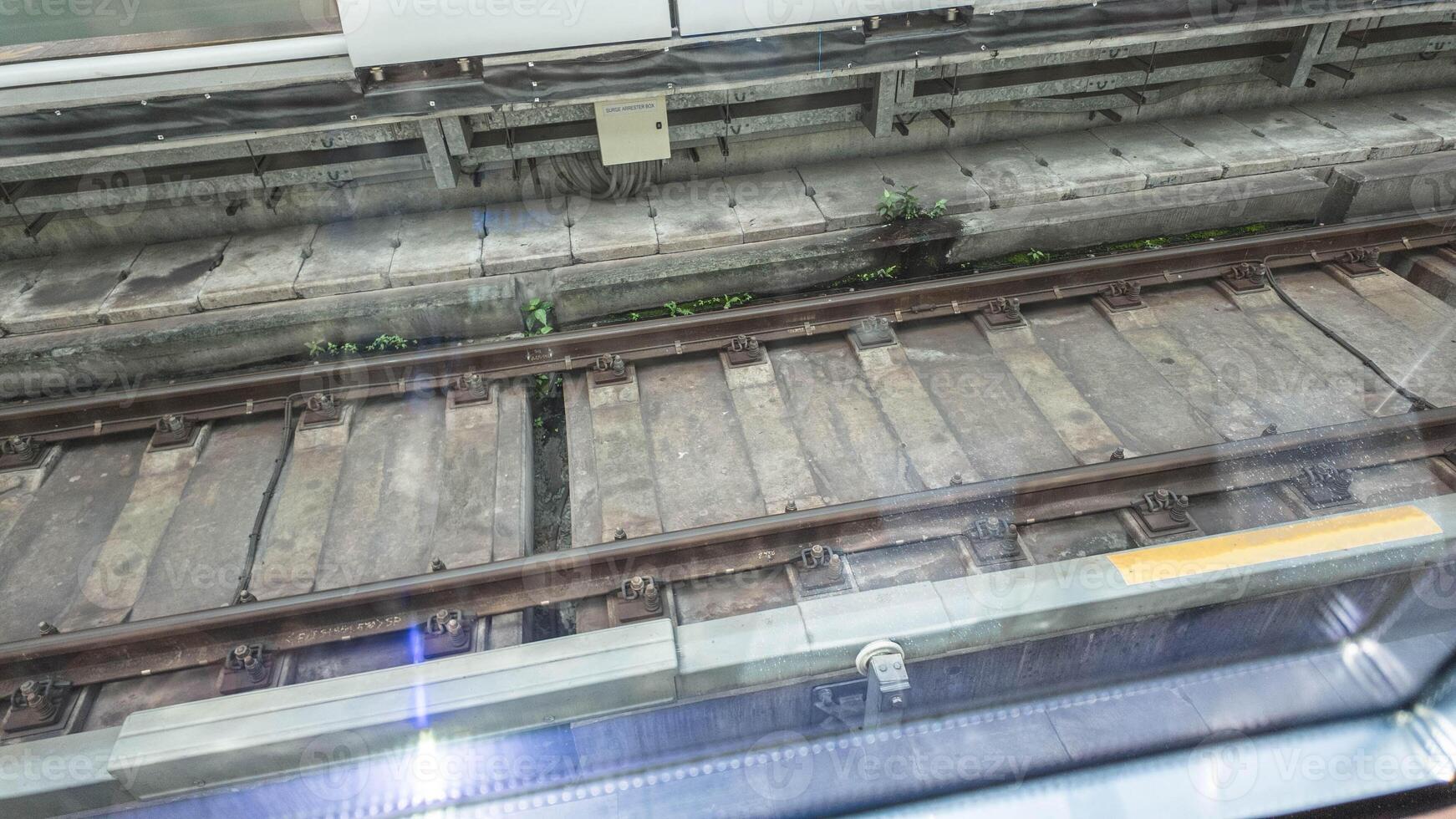 transportation railway electric train railroad track vechicle travel public station mode transport outdoor capital commuter cityscape destination travel trip journey repair business traffic city steel photo
