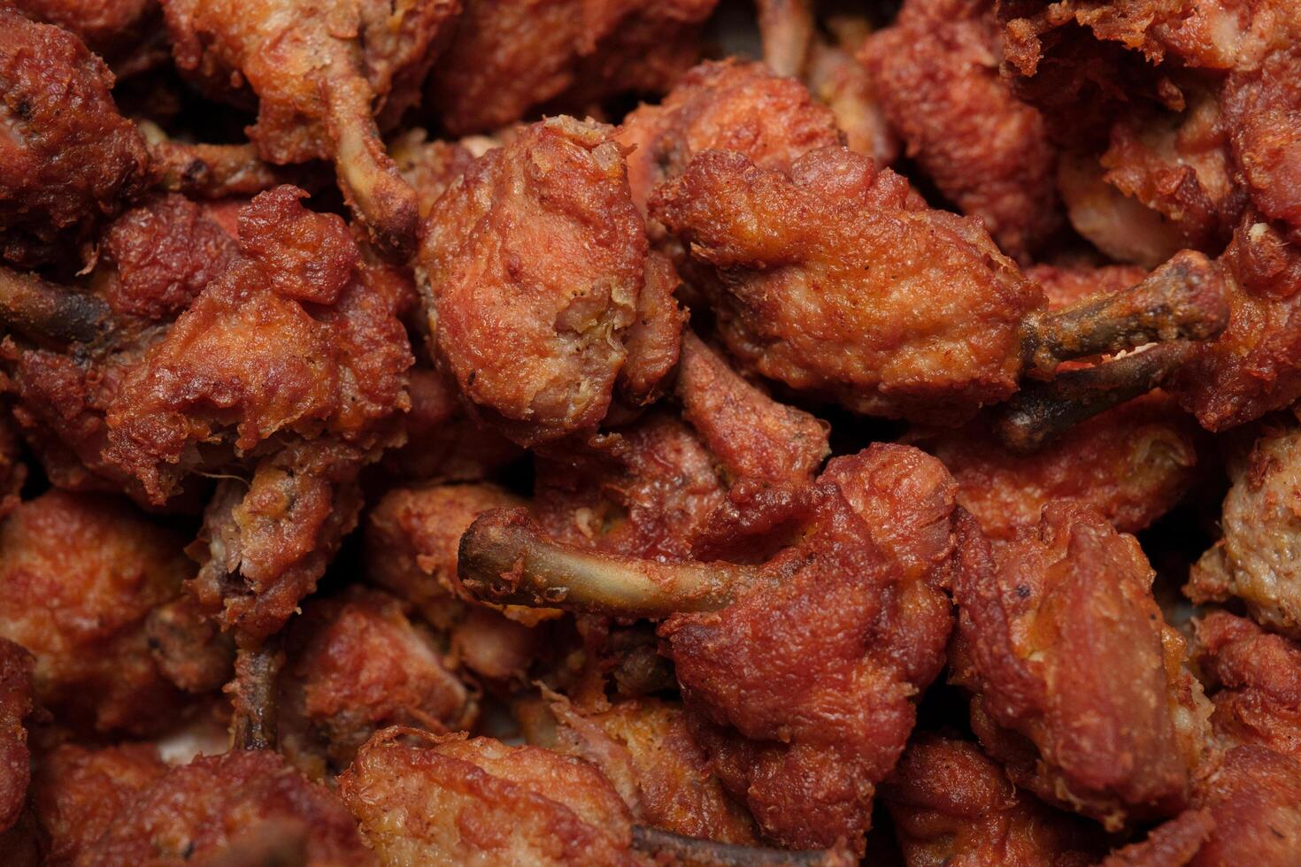 a close up of fried chicken in a bowl photo