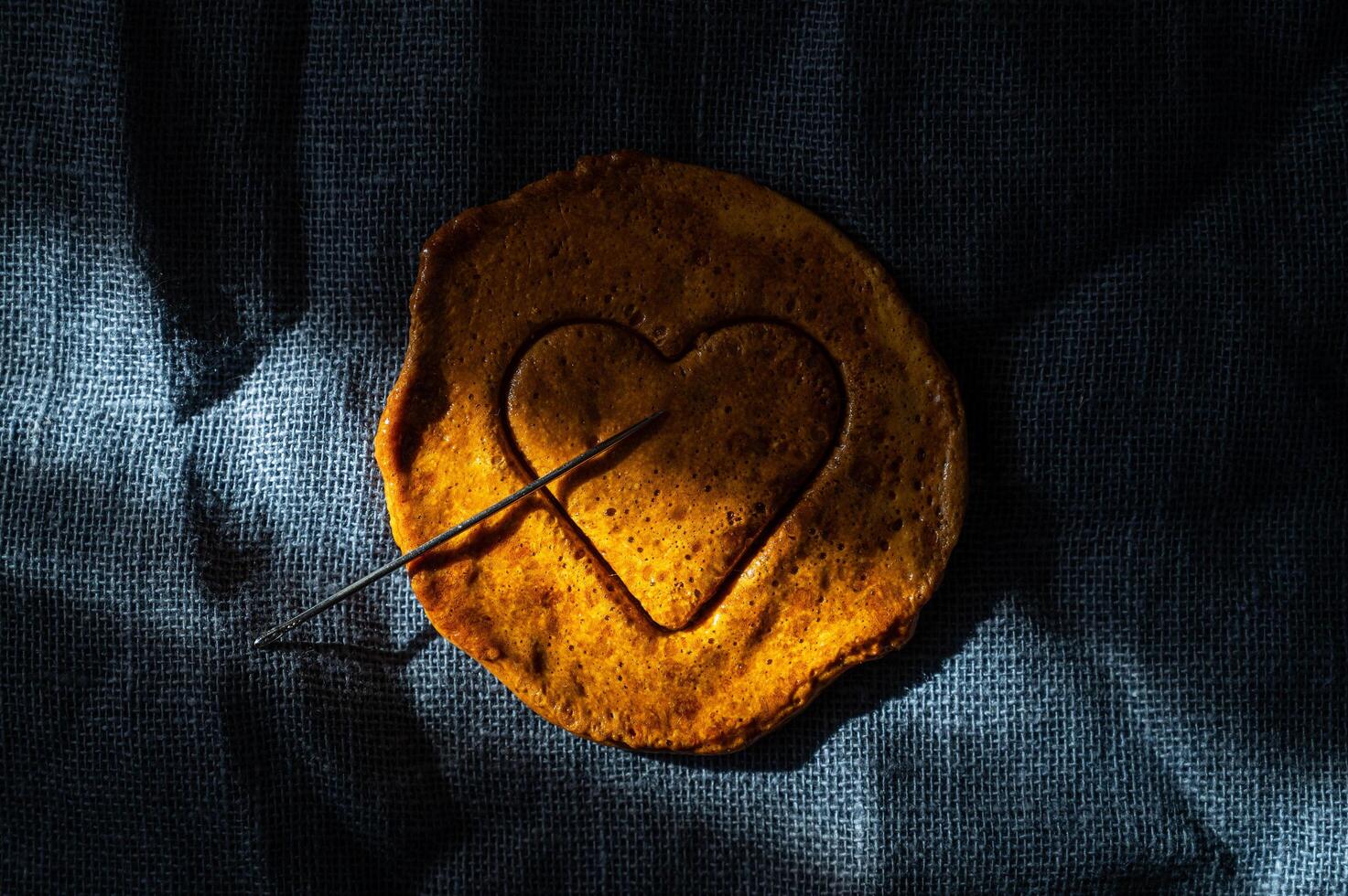 Brown sugar caramel candy cookies with a metal needle photo