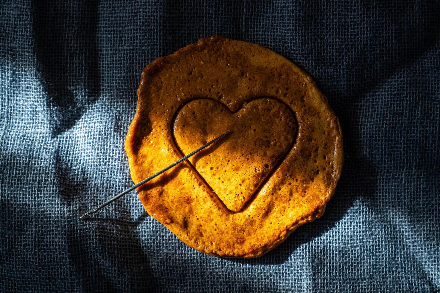 Brown sugar caramel candy cookies with a metal needle photo