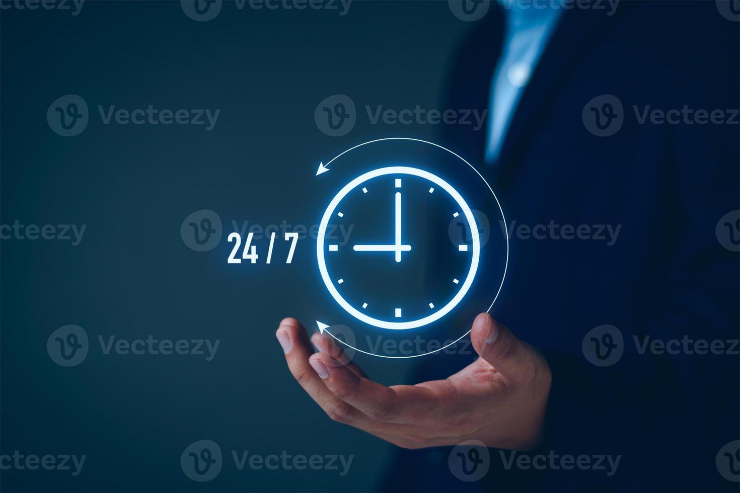 nonstop service concept. businessman show virtual 24-7 with clock for worldwide nonstop and full-time available contact of customer service concept. digital online customer service on internet network photo