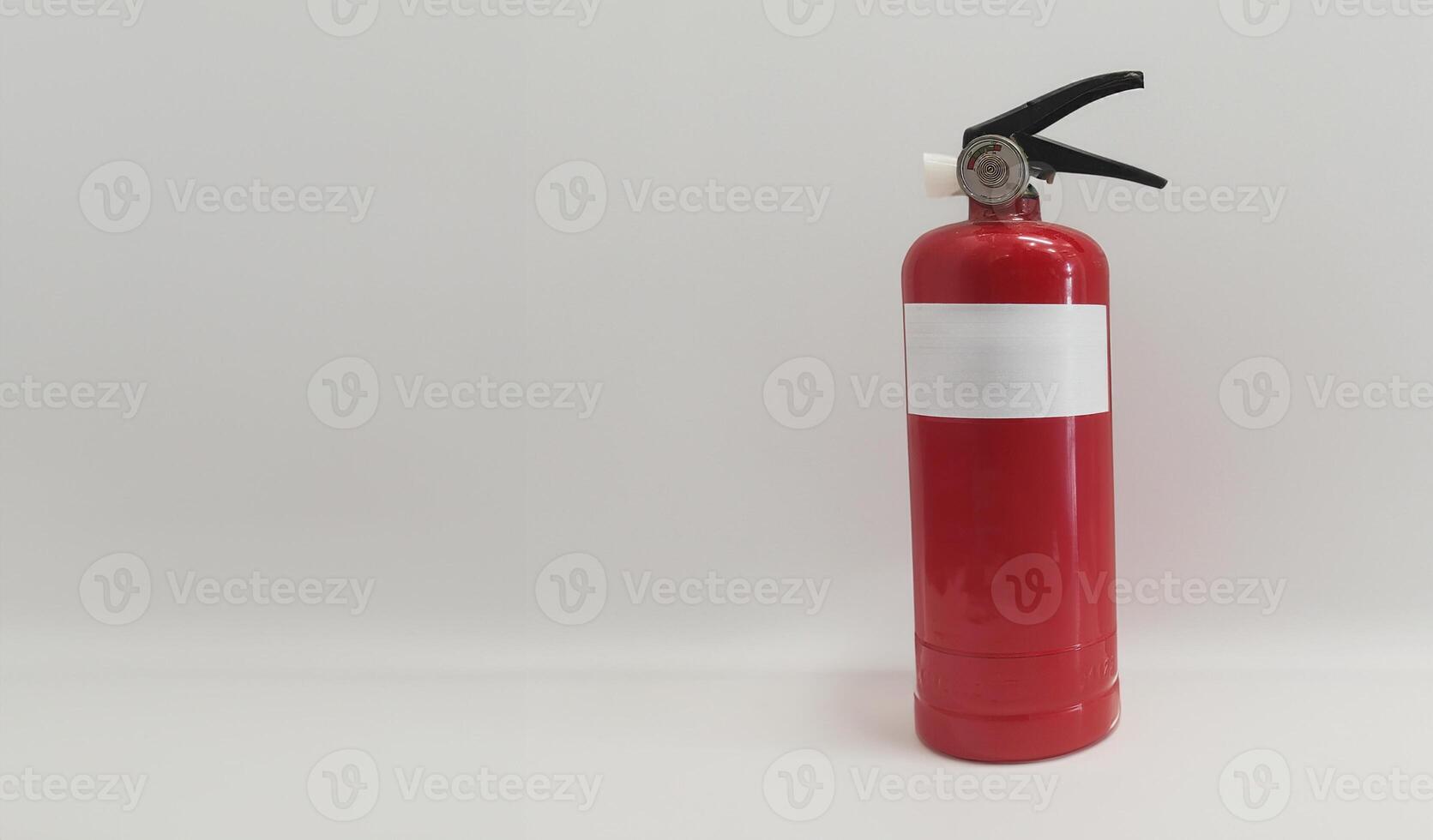 Red fire extinguisher isolated on white background, safety concept photo