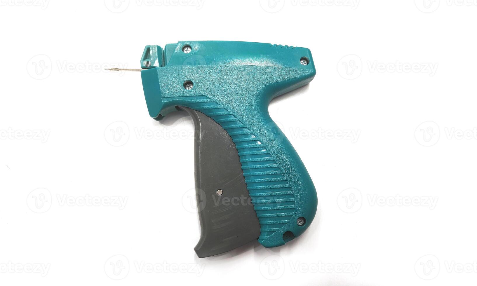 label tagging gun on isolated on white background photo
