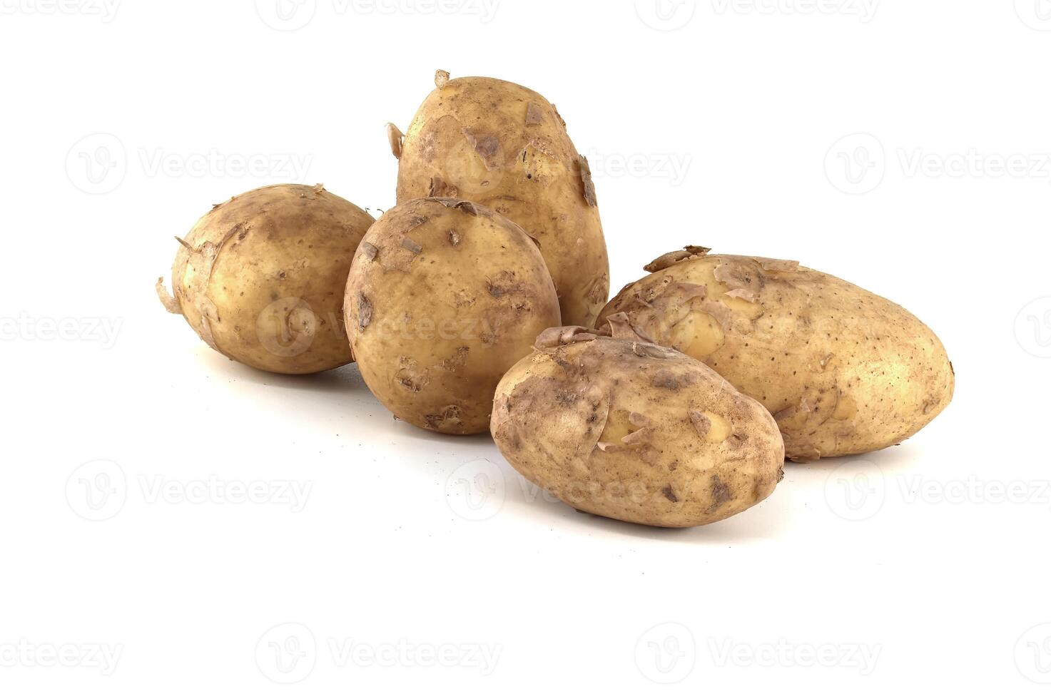 Early season potatoes isolated on white background photo