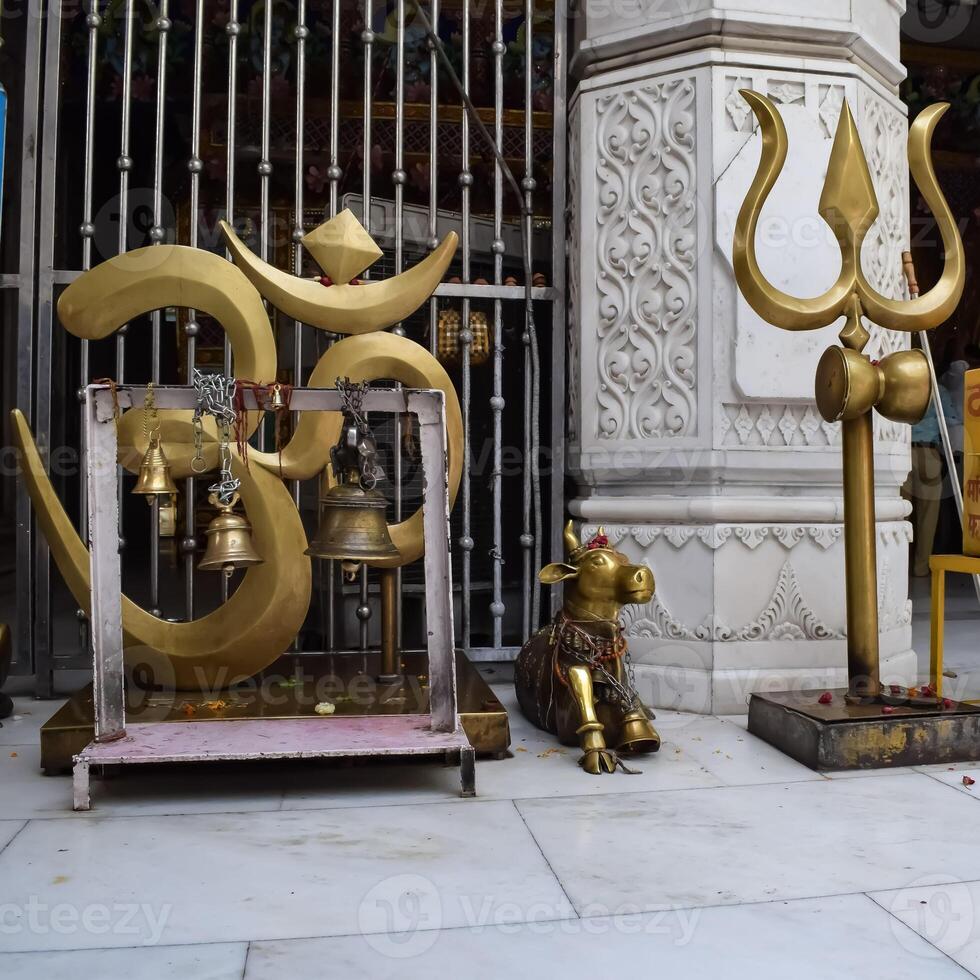 Big symbol of OM near Delhi International airport, Delhi, India, Om big symbol inside temple at main highway Mahipalpur, Delhi photo