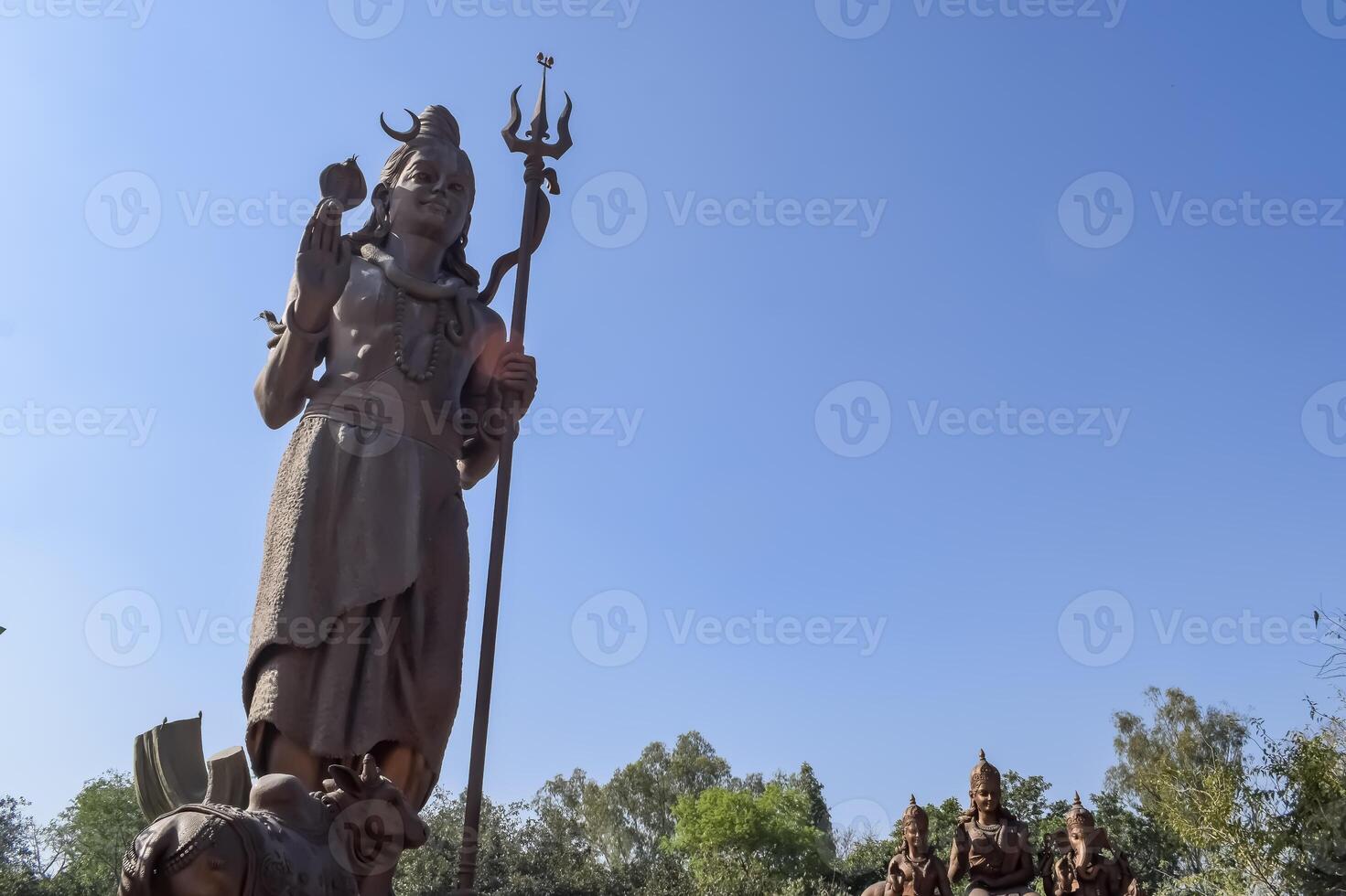 Big statue of Lord Shiv near Delhi International airport, Delhi, India, Lord Shiv big statue touching sky at main highway Mahipalpur, Delhi photo