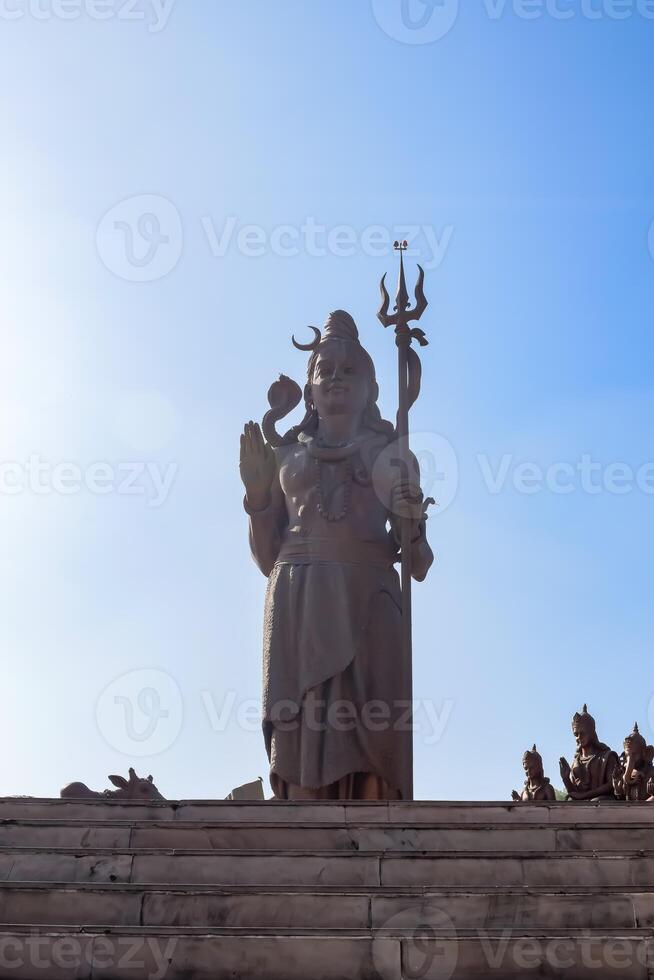 Big statue of Lord Shiv near Delhi International airport, Delhi, India, Lord Shiv big statue touching sky at main highway Mahipalpur, Delhi photo