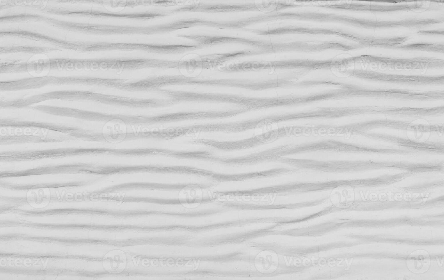 White cement wall curved with wave pattern. Modern design of white wavy background photo