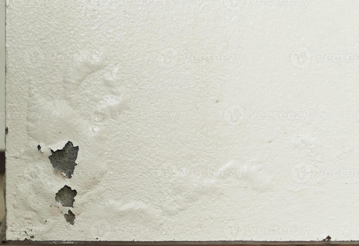 Paint peeling and swelling from moisture photo