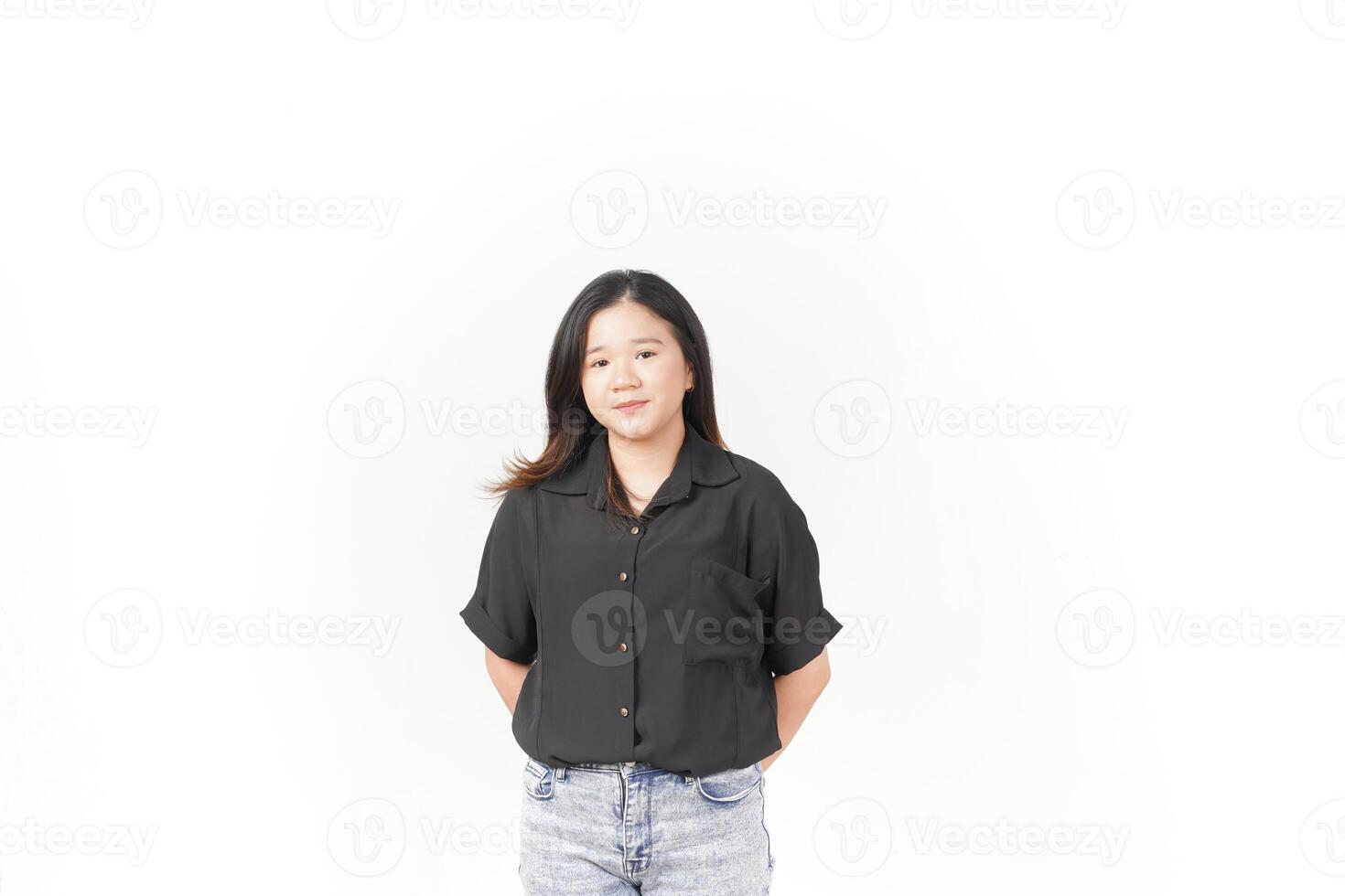 Young Asian woman standing and looking at camera wearing Black t-shirt and jeans isolated on white background photo