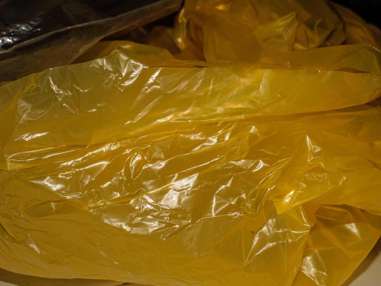 close up texture of yellow plastic bag photo