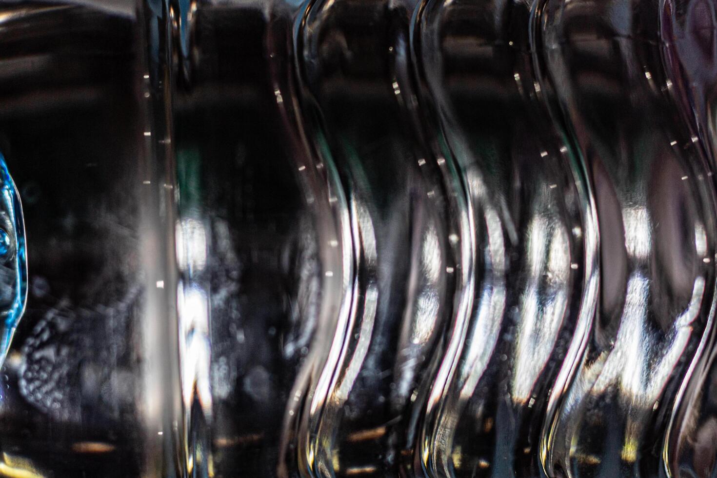 Abstract background close up of Water bottle detail that glows like crystal photo