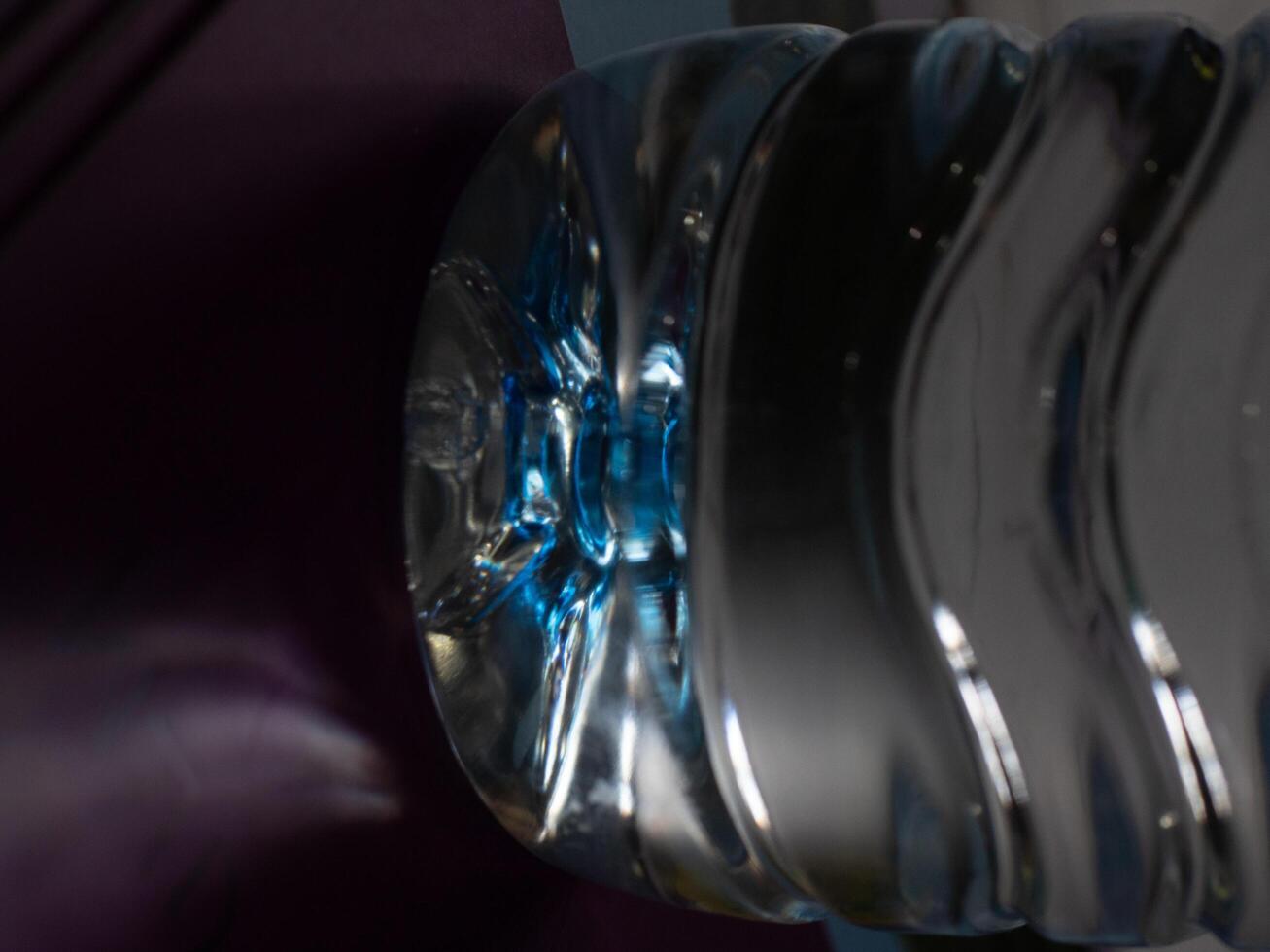 Abstract background close up of Water bottle detail that glows like crystal photo