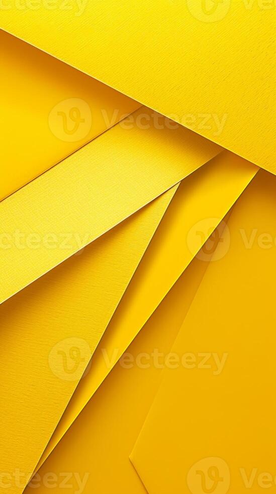 Bright yellow paper layers creating abstract art photo