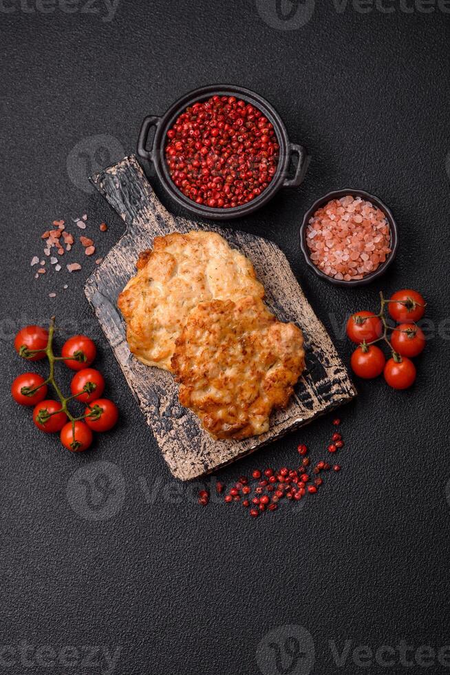 Delicious fried pork or chicken chops breaded with salt and spices photo