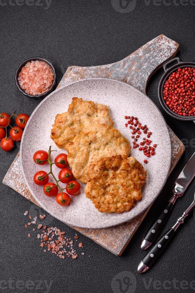 Delicious fried pork or chicken chops breaded with salt and spices photo