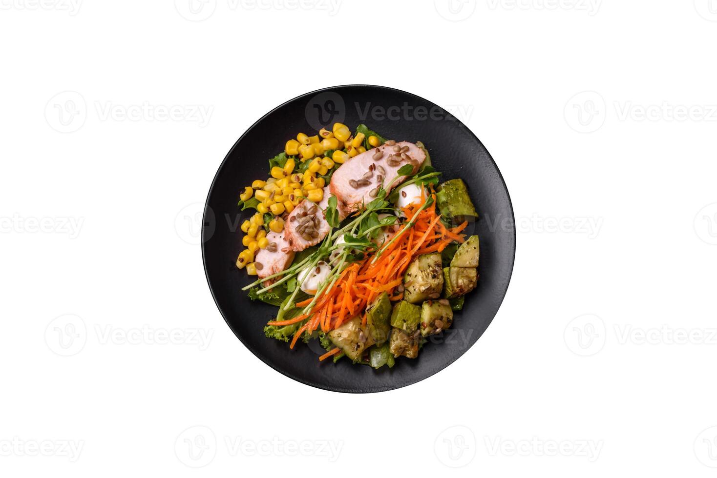 Fresh juicy salad with meat, mozzarella, carrots, lettuce, corn photo