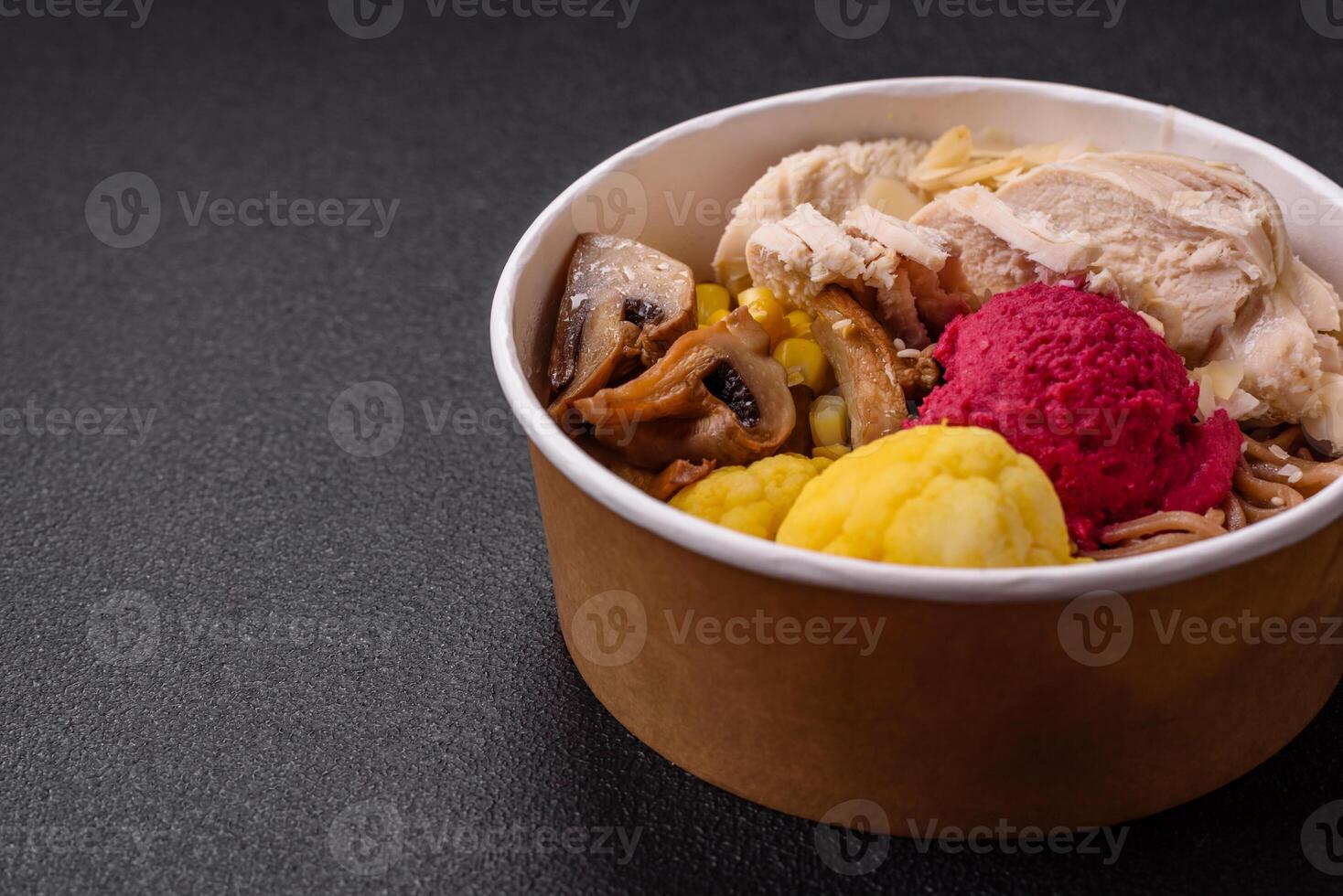 Asian dish with sliced chicken fillet, buckwheat noodles, soy sauce photo