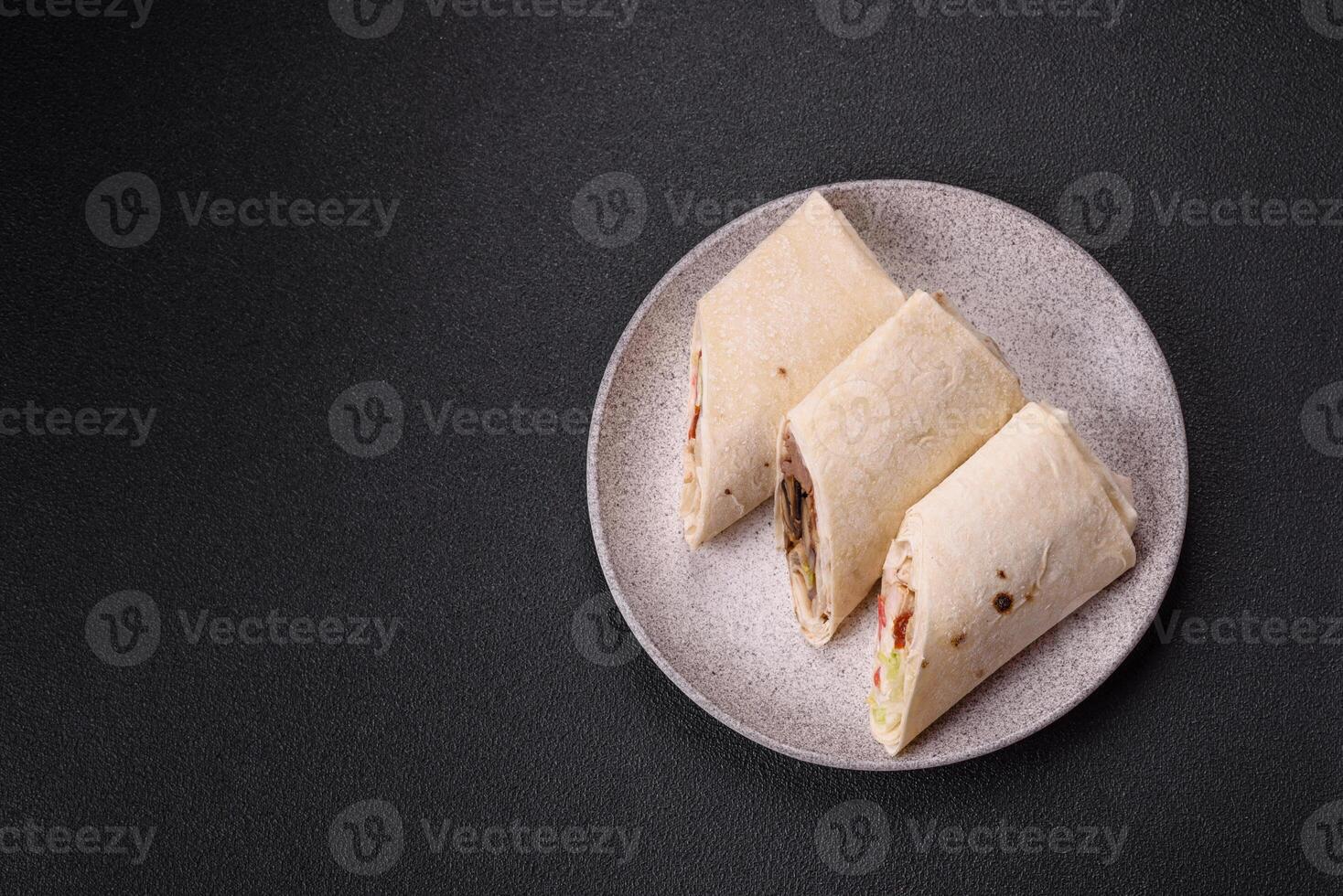 Delicious traditional shawarma or doner kebab with chicken photo