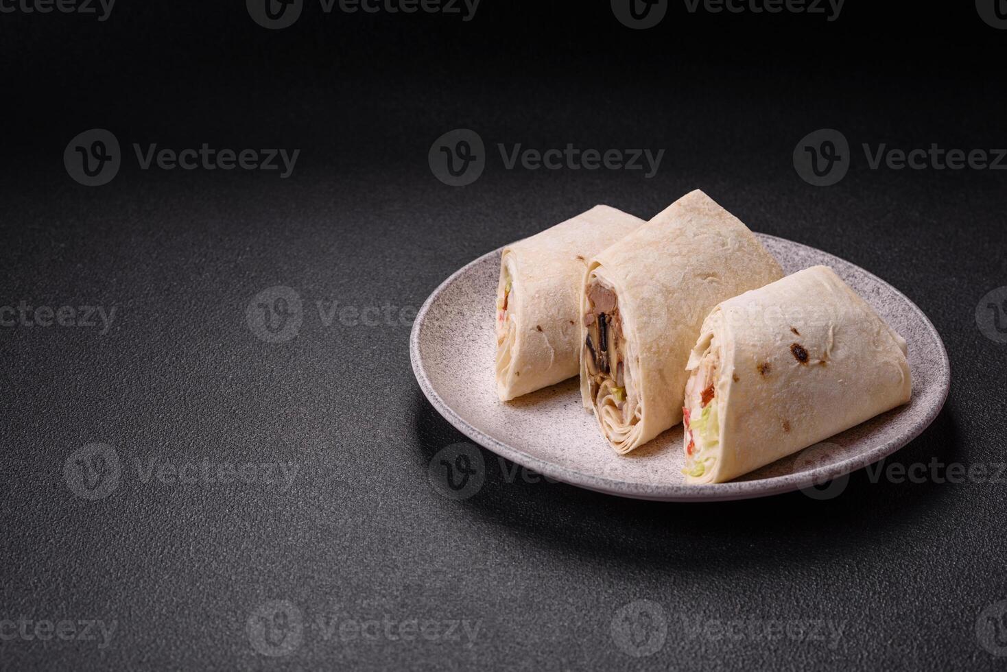 Delicious traditional shawarma or doner kebab with chicken photo