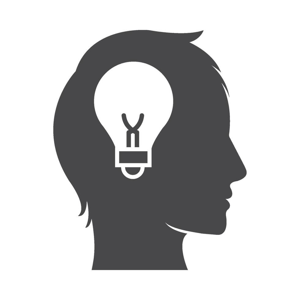 A silhouette of a man's head with an idea light bulb vector