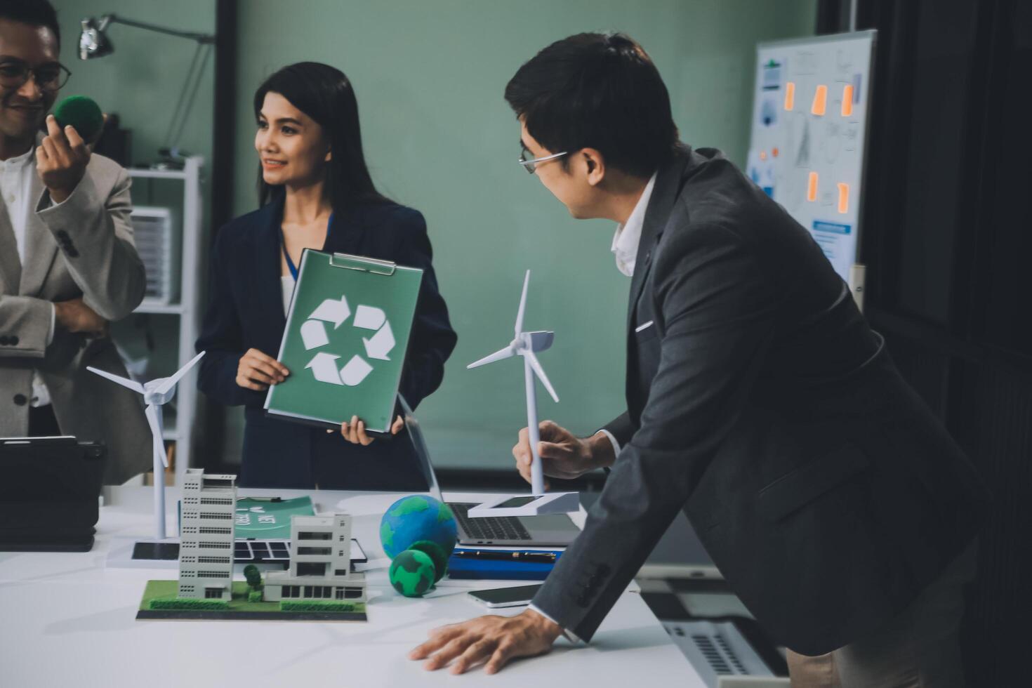Carbon offset price report CO2 emission. Future growth Net zero waste in ESG ethical SME office protect climate change global warming social issues project. Group of asia people Eco friendly SDGs plan photo