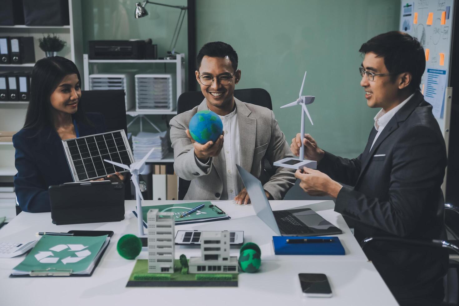 Carbon offset price report CO2 emission. Future growth Net zero waste in ESG ethical SME office protect climate change global warming social issues project. Group of asia people Eco friendly SDGs plan photo