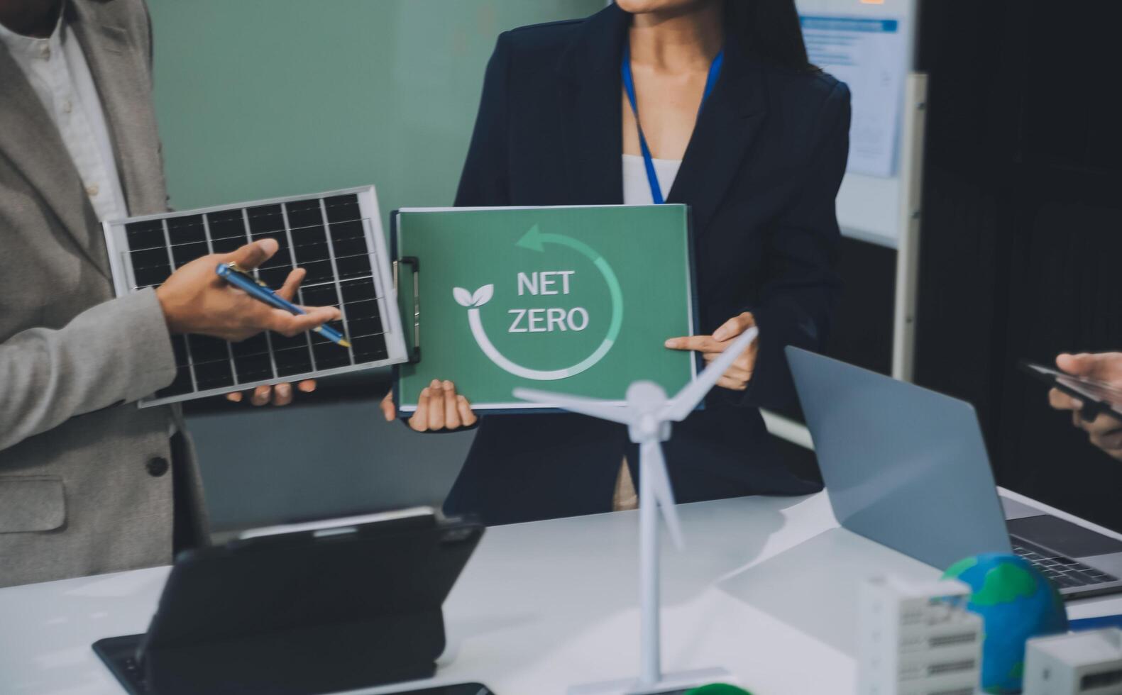 Carbon offset price report CO2 emission. Future growth Net zero waste in ESG ethical SME office protect climate change global warming social issues project. Group of asia people Eco friendly SDGs plan photo