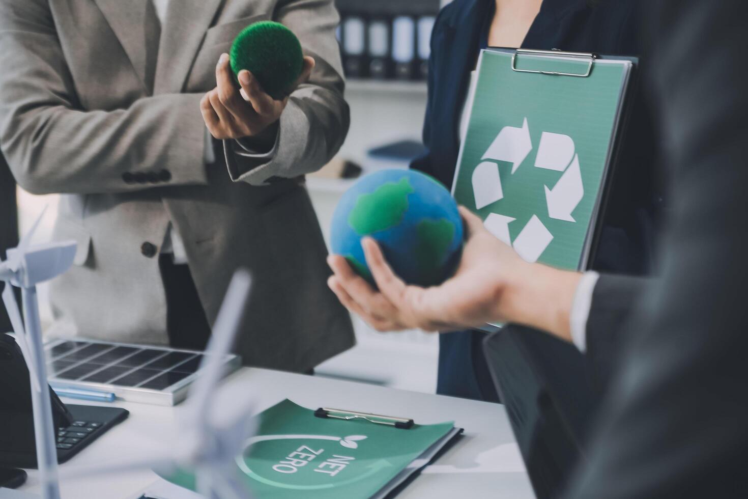 Carbon offset price report CO2 emission. Future growth Net zero waste in ESG ethical SME office protect climate change global warming social issues project. Group of asia people Eco friendly SDGs plan photo