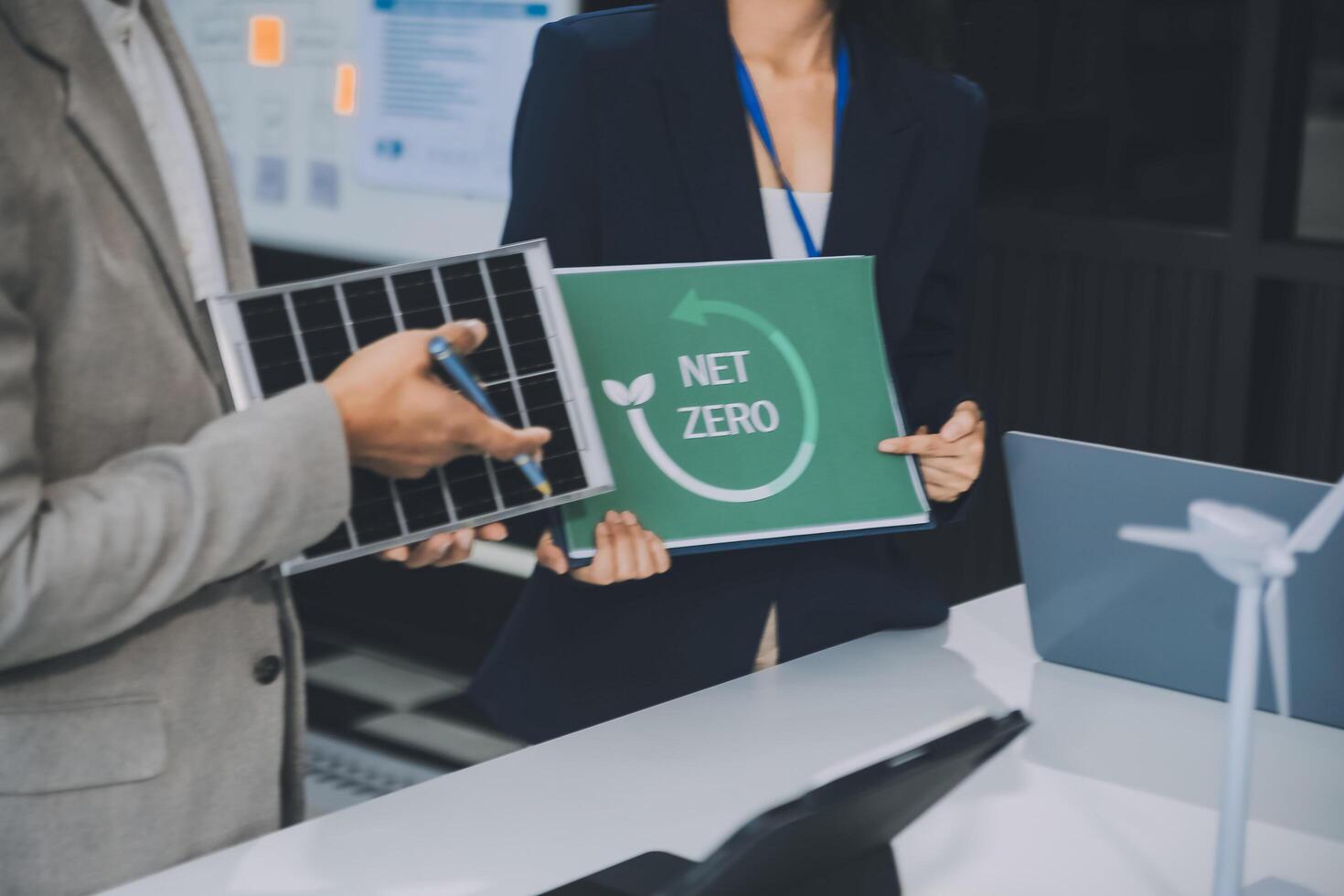 Carbon offset price report CO2 emission. Future growth Net zero waste in ESG ethical SME office protect climate change global warming social issues project. Group of asia people Eco friendly SDGs plan photo