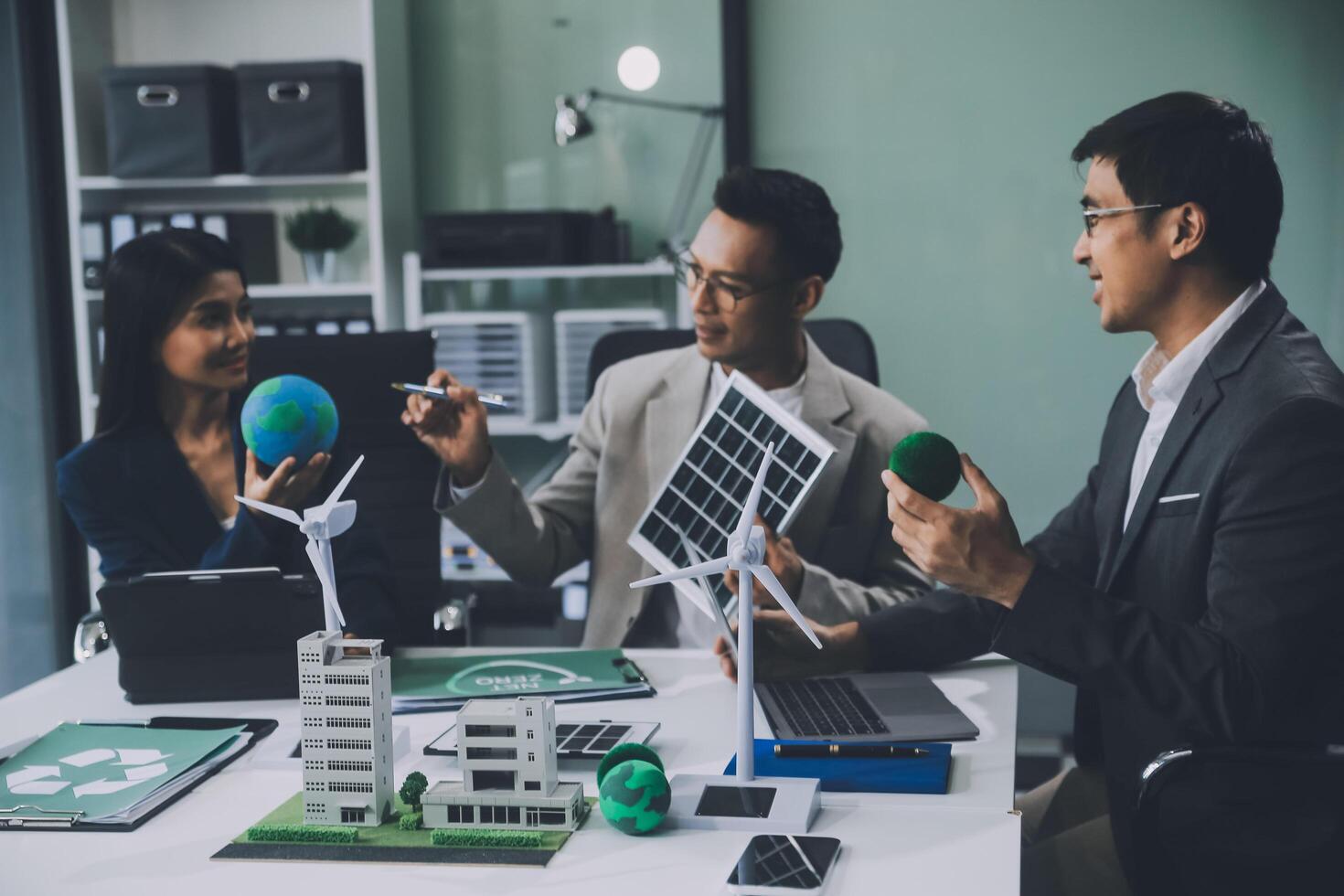Carbon offset price report CO2 emission. Future growth Net zero waste in ESG ethical SME office protect climate change global warming social issues project. Group of asia people Eco friendly SDGs plan photo