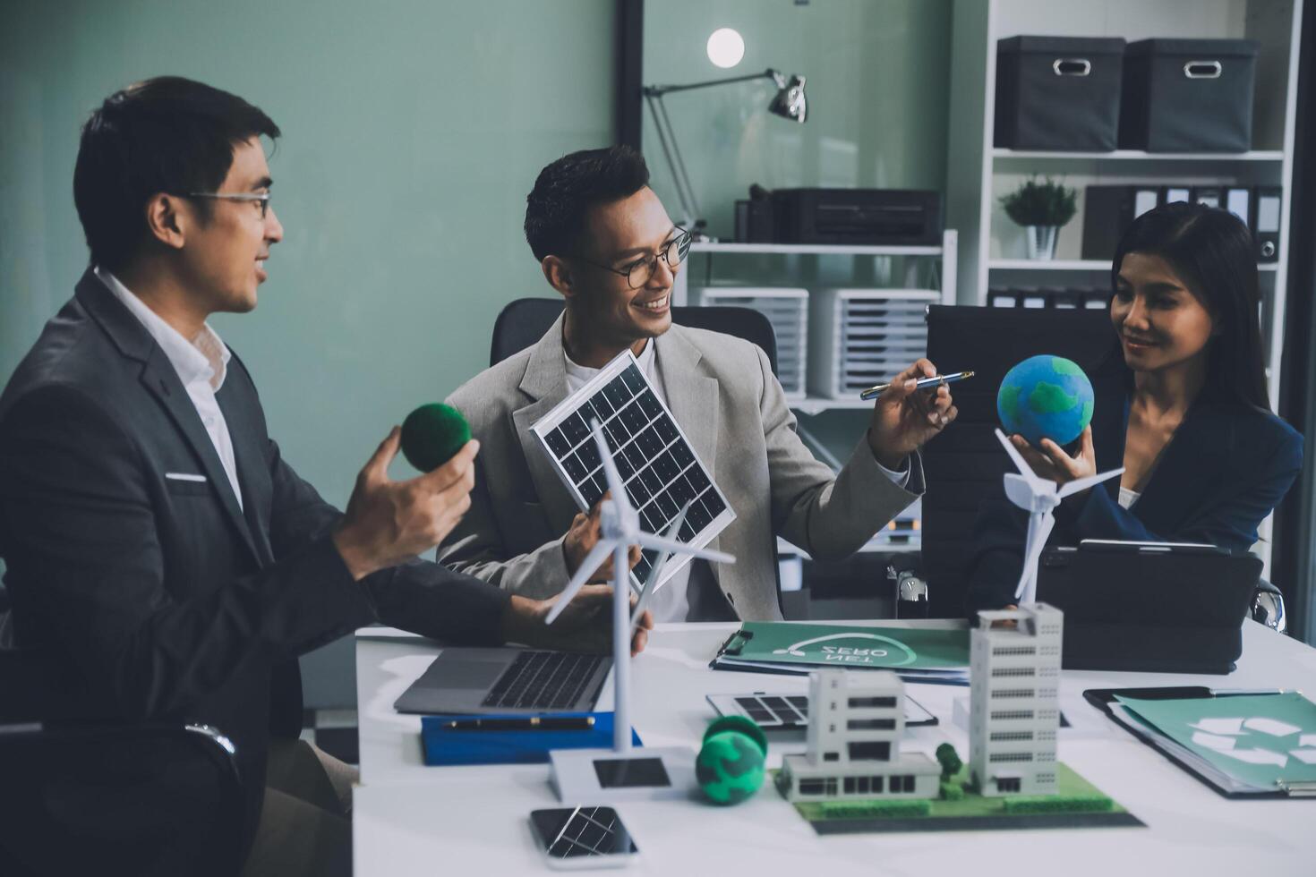 Carbon offset price report CO2 emission. Future growth Net zero waste in ESG ethical SME office protect climate change global warming social issues project. Group of asia people Eco friendly SDGs plan photo