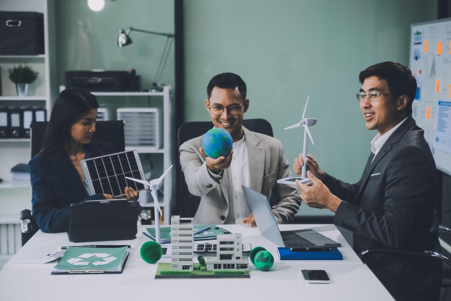 Carbon offset price report CO2 emission. Future growth Net zero waste in ESG ethical SME office protect climate change global warming social issues project. Group of asia people Eco friendly SDGs plan photo