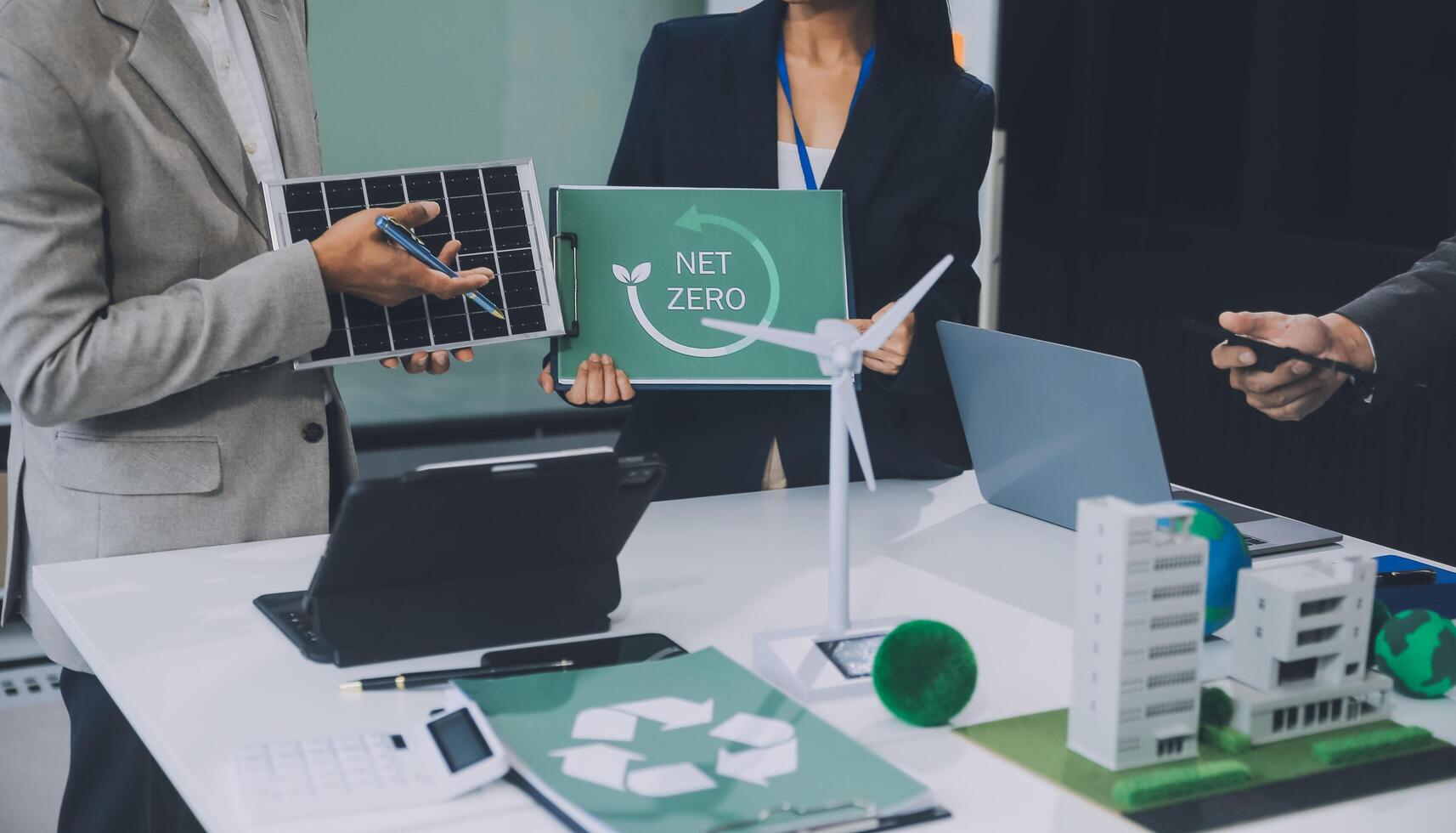 Carbon offset price report CO2 emission. Future growth Net zero waste in ESG ethical SME office protect climate change global warming social issues project. Group of asia people Eco friendly SDGs plan photo