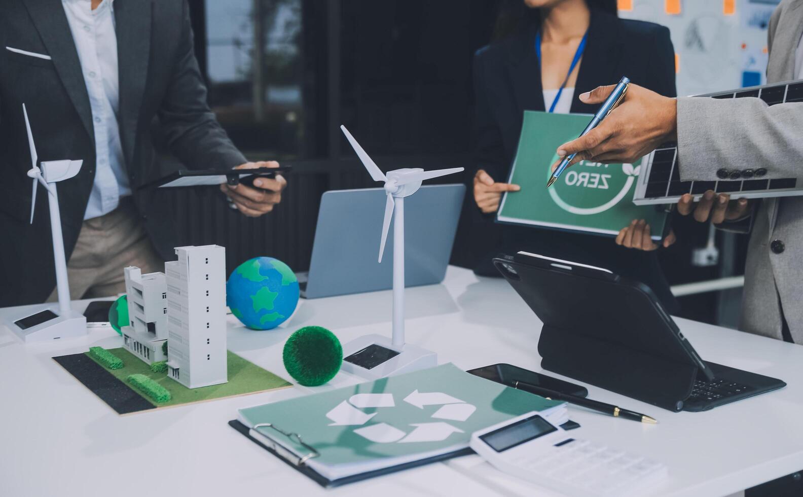 Carbon offset price report CO2 emission. Future growth Net zero waste in ESG ethical SME office protect climate change global warming social issues project. Group of asia people Eco friendly SDGs plan photo